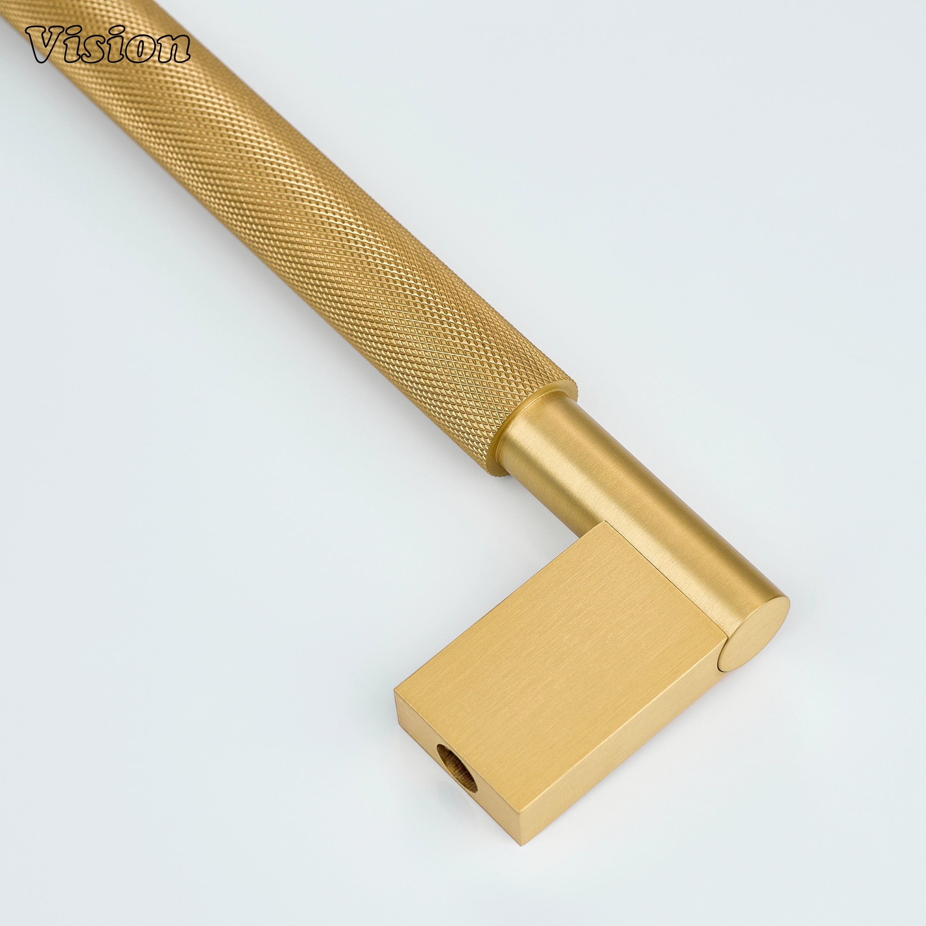 Gold knurled appliance pull designed for panel-ready refrigerator doors.