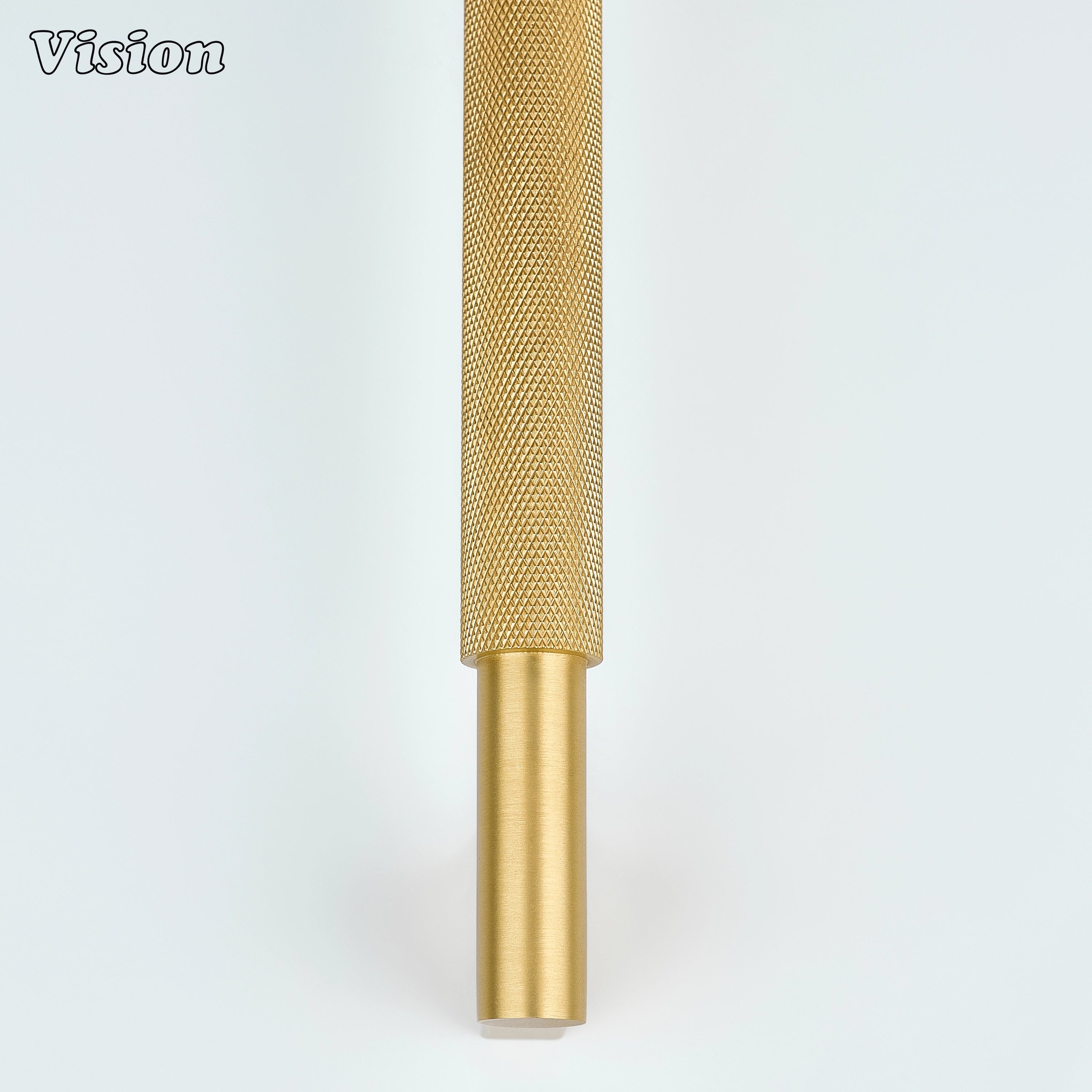 Gold knurled brass appliance pull with bar profile for utility room cabinets.