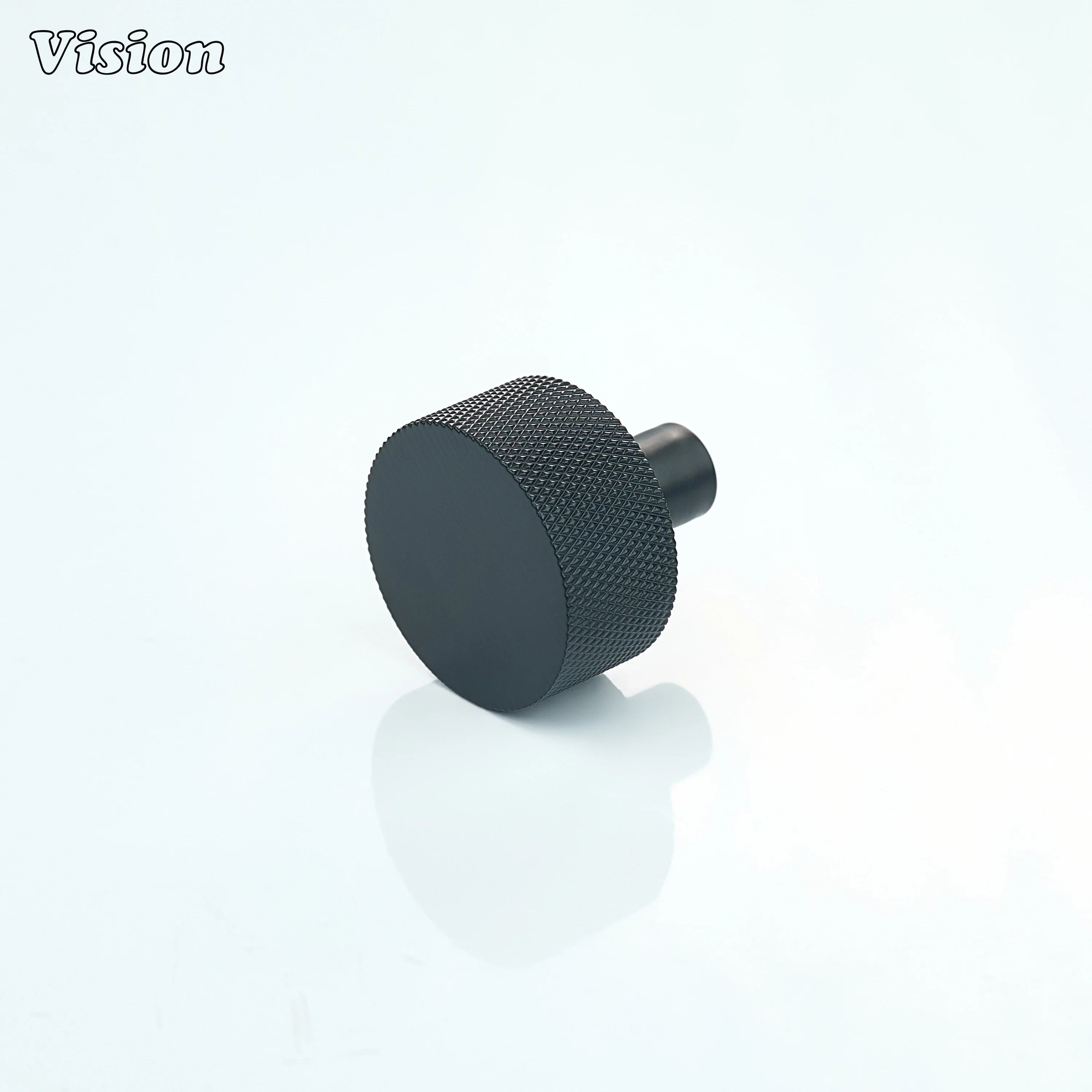 Black cabinet knob with round knurled texture for kitchen cabinets