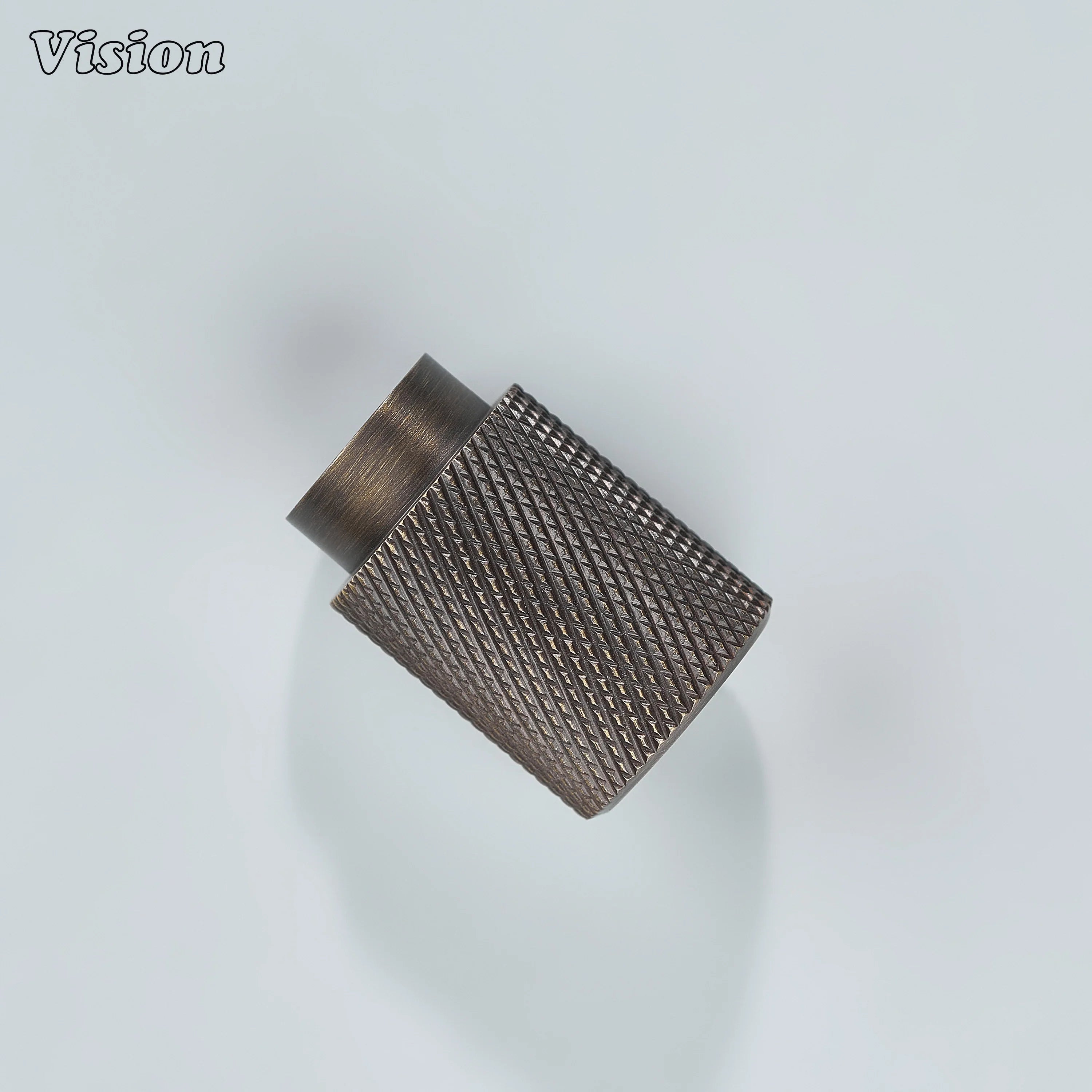 Modern antique bronze knurled cylinder knob used for dresser drawers.