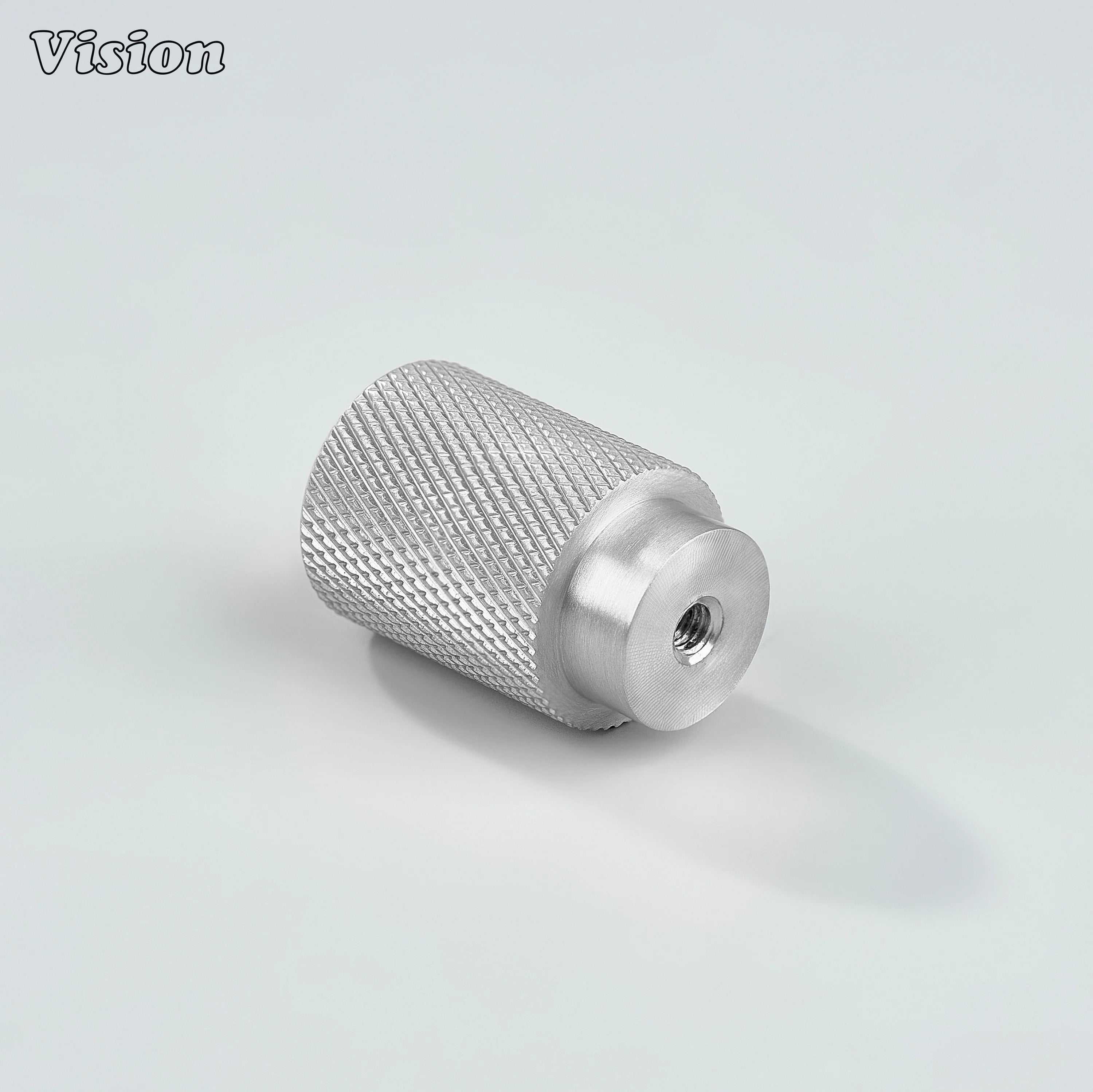 Modern silver knurled cylinder knob used for dresser drawers.