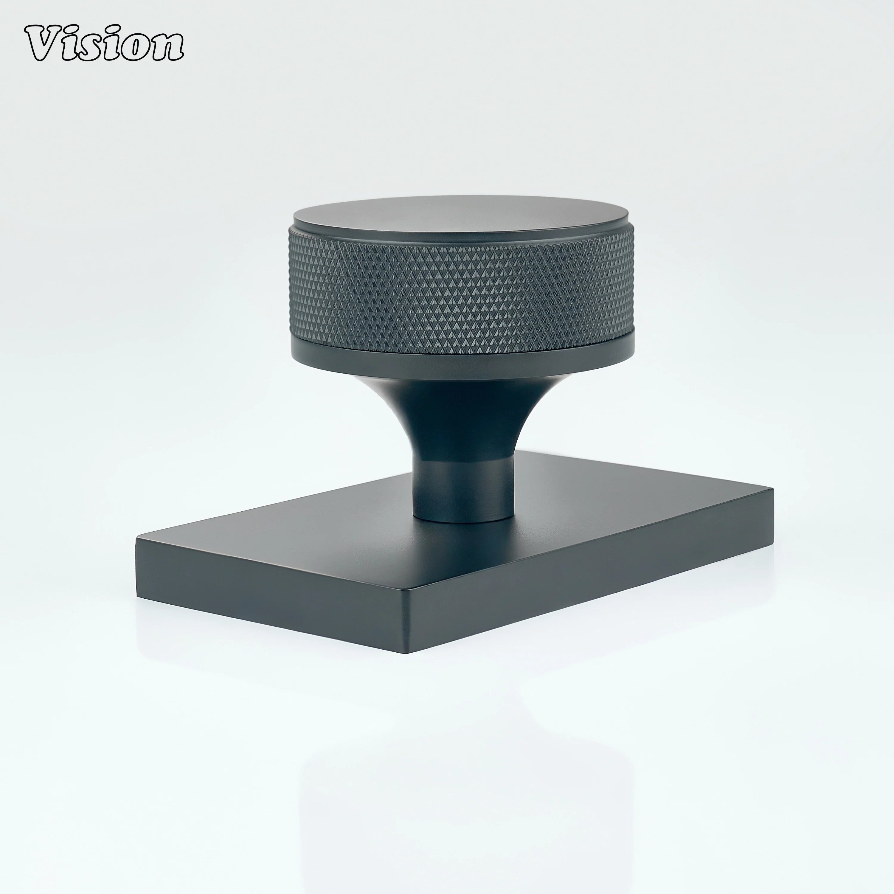 Black knurled door knob and rectangular plate for modern door hardware