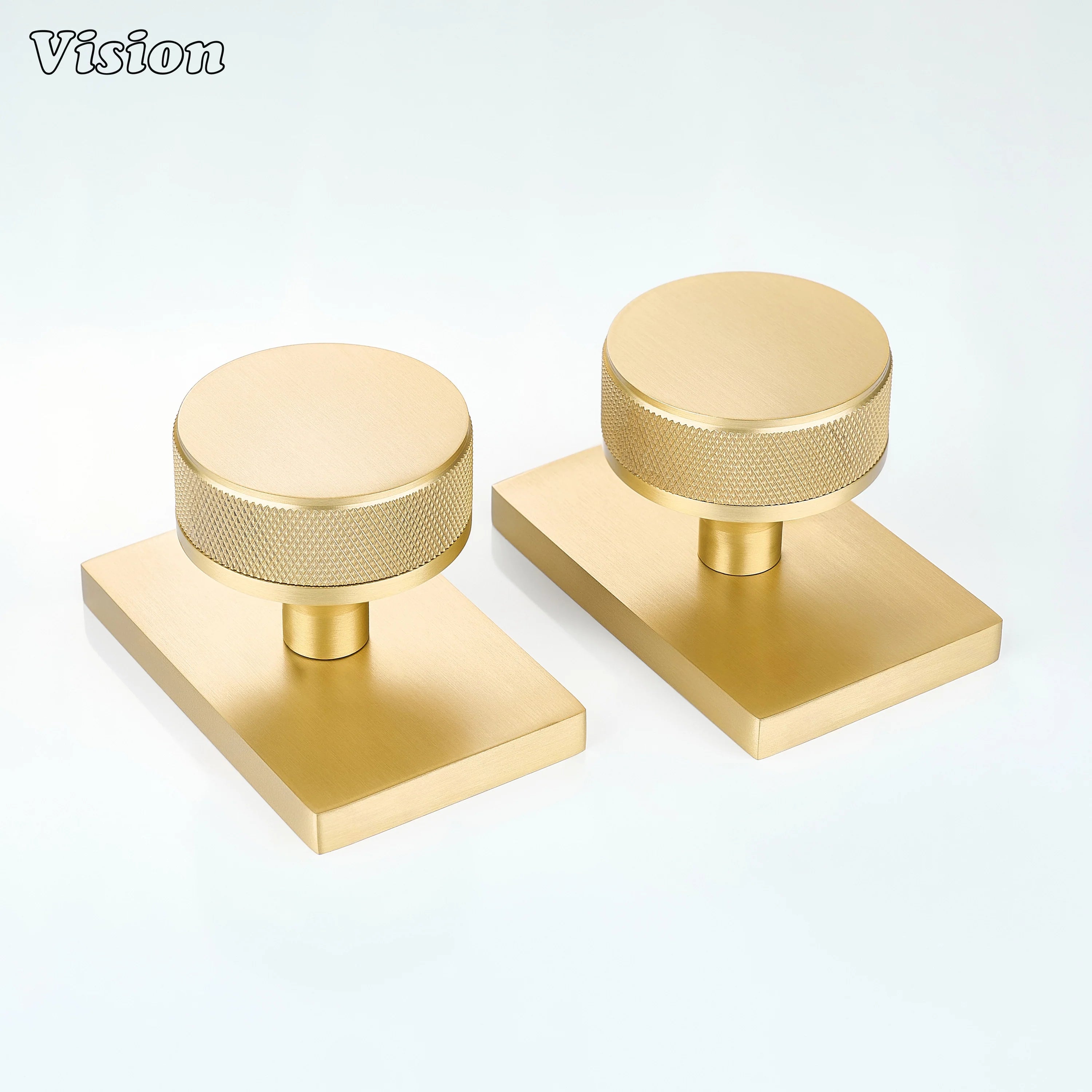 Gold round knurled door knob with rectangular base for industrial style interior doors