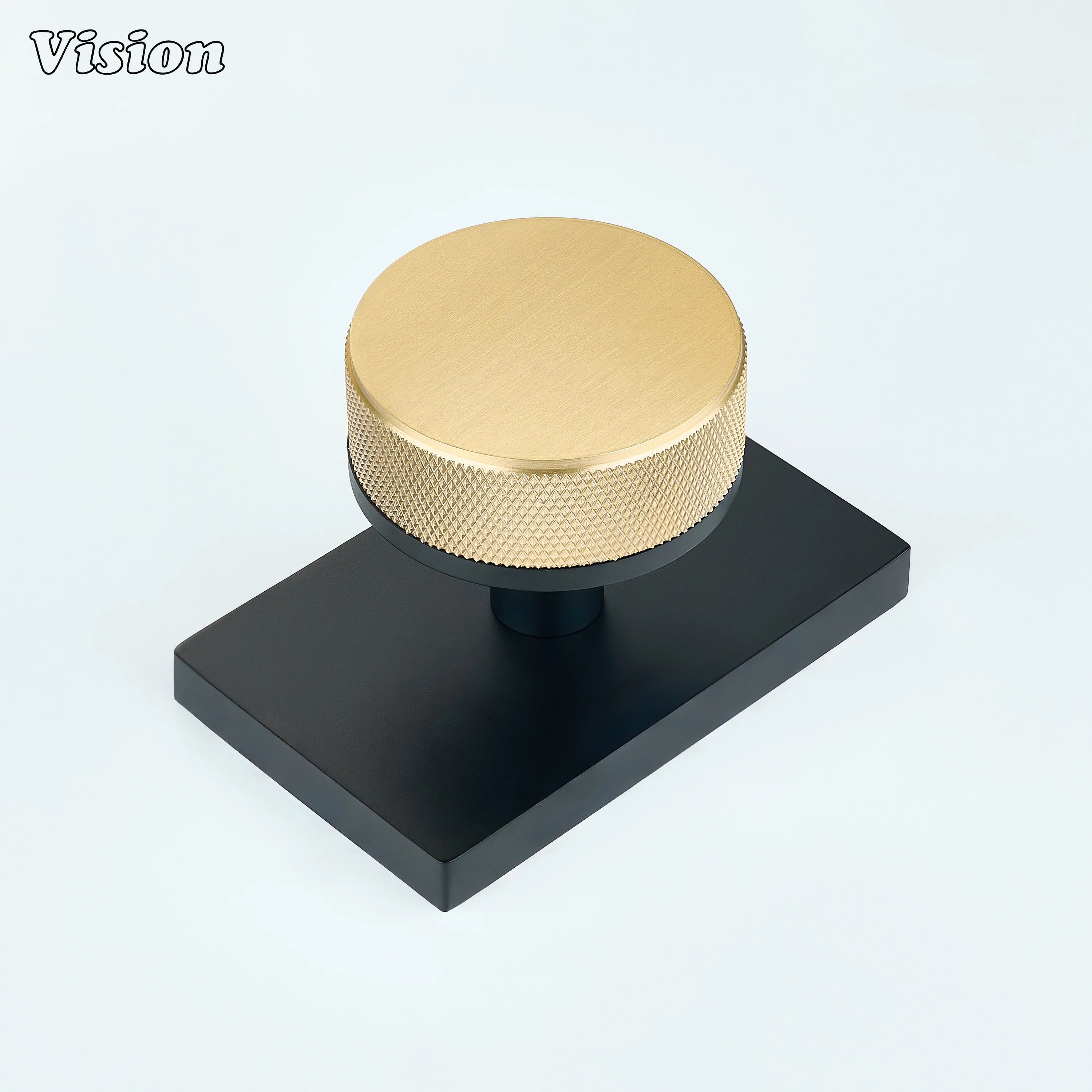 Gold and Black knurled round door knob with gold knob and black rectangular backplate
