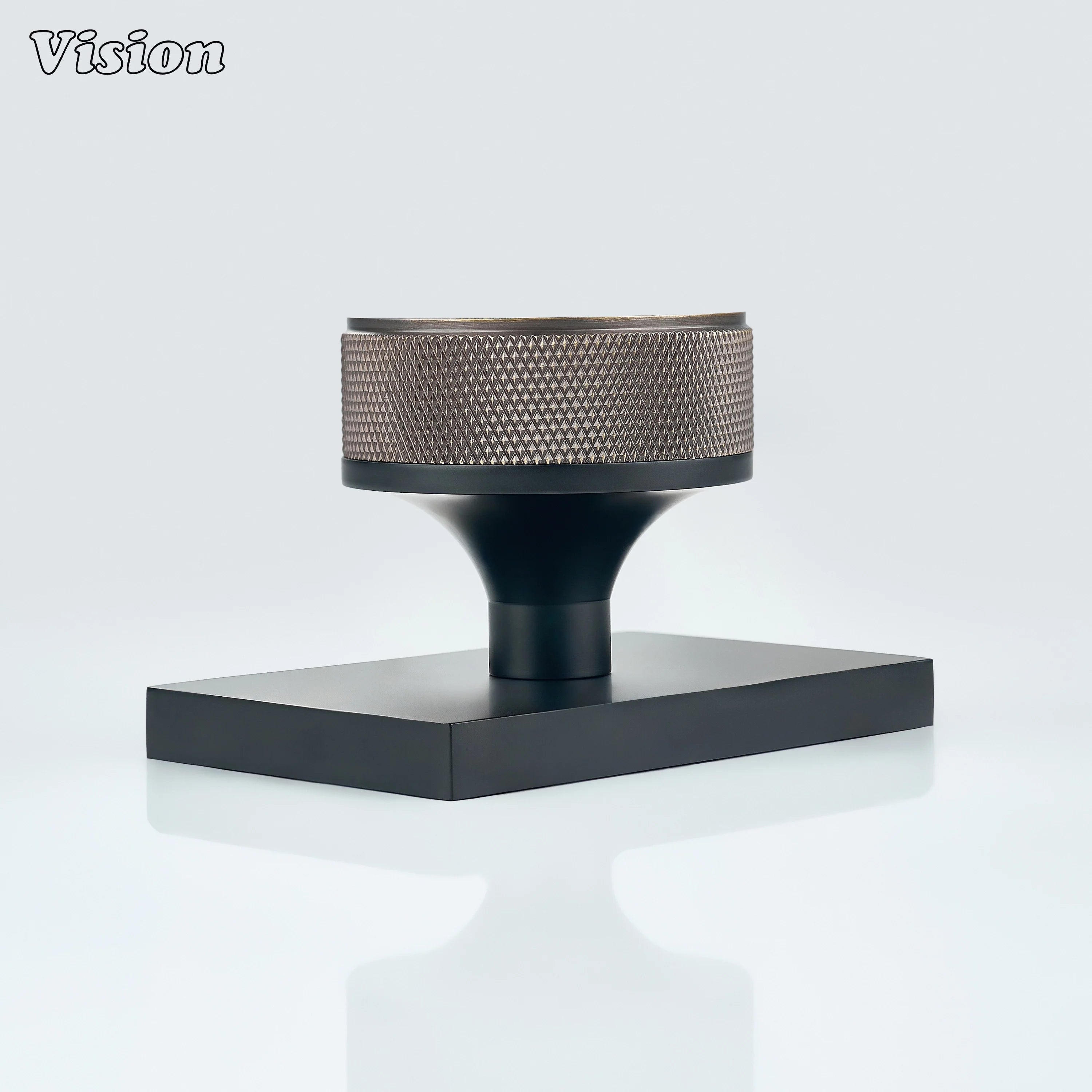 Antique Bronze and Black door knob with knurled grip and black conceal plate