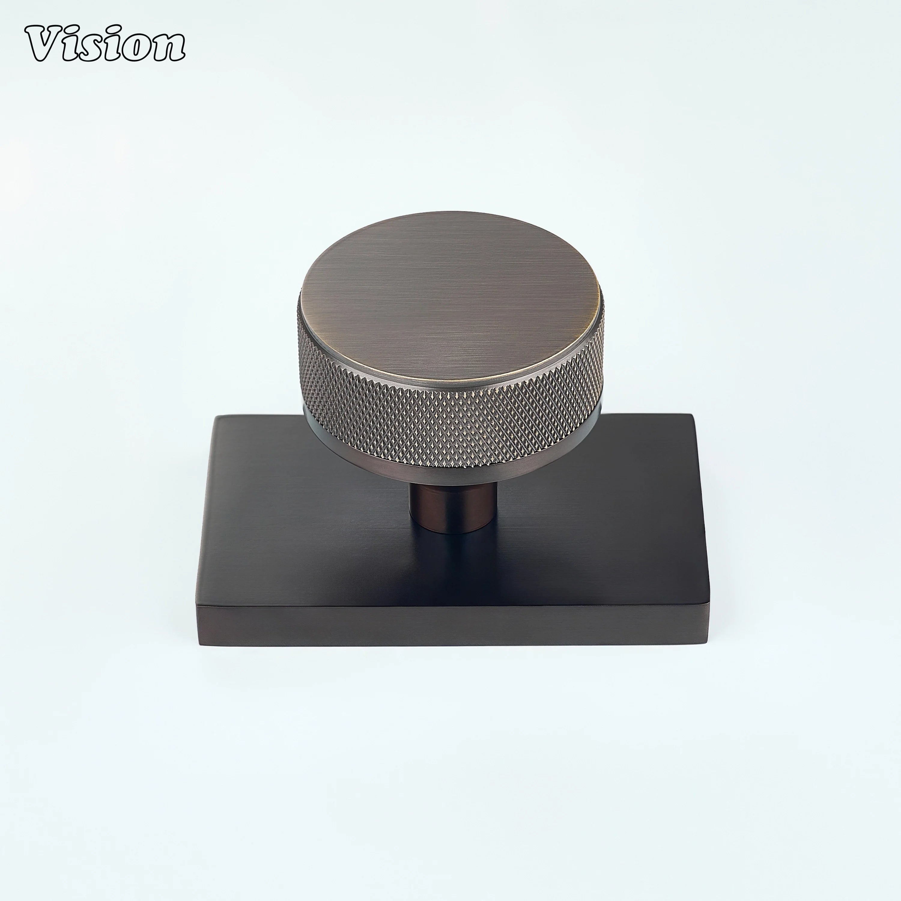 Antique Bronze and Oil Rubbed Bronze knurled door knob designed for industrial interiors