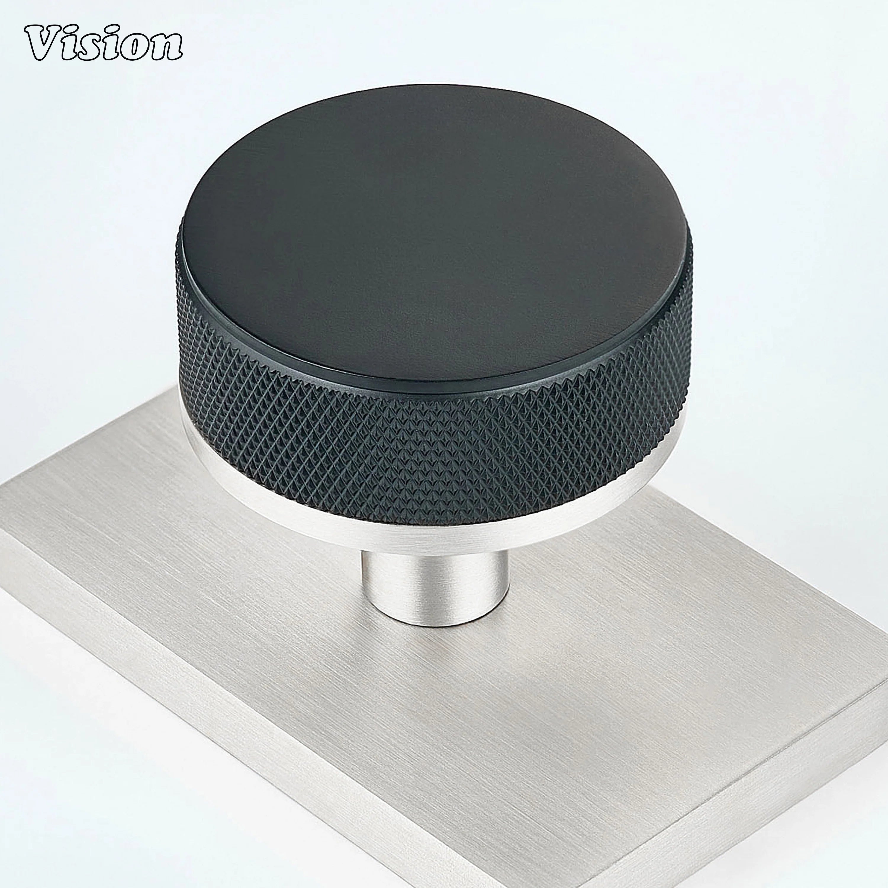 Black and Silver solid brass door knob with contrasting rectangular backplate