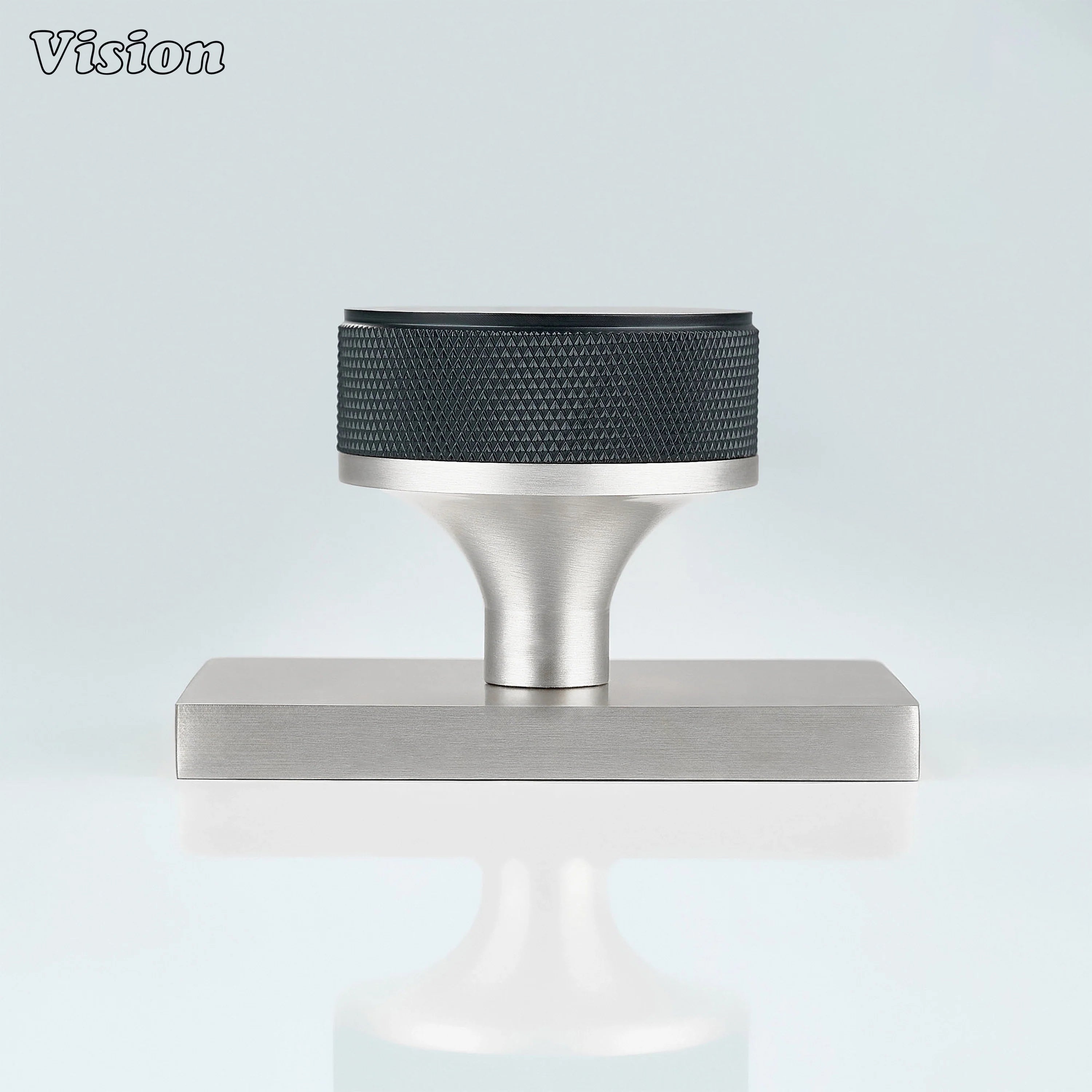 Black and Silver door knob with knurled grip and silver conceal plate