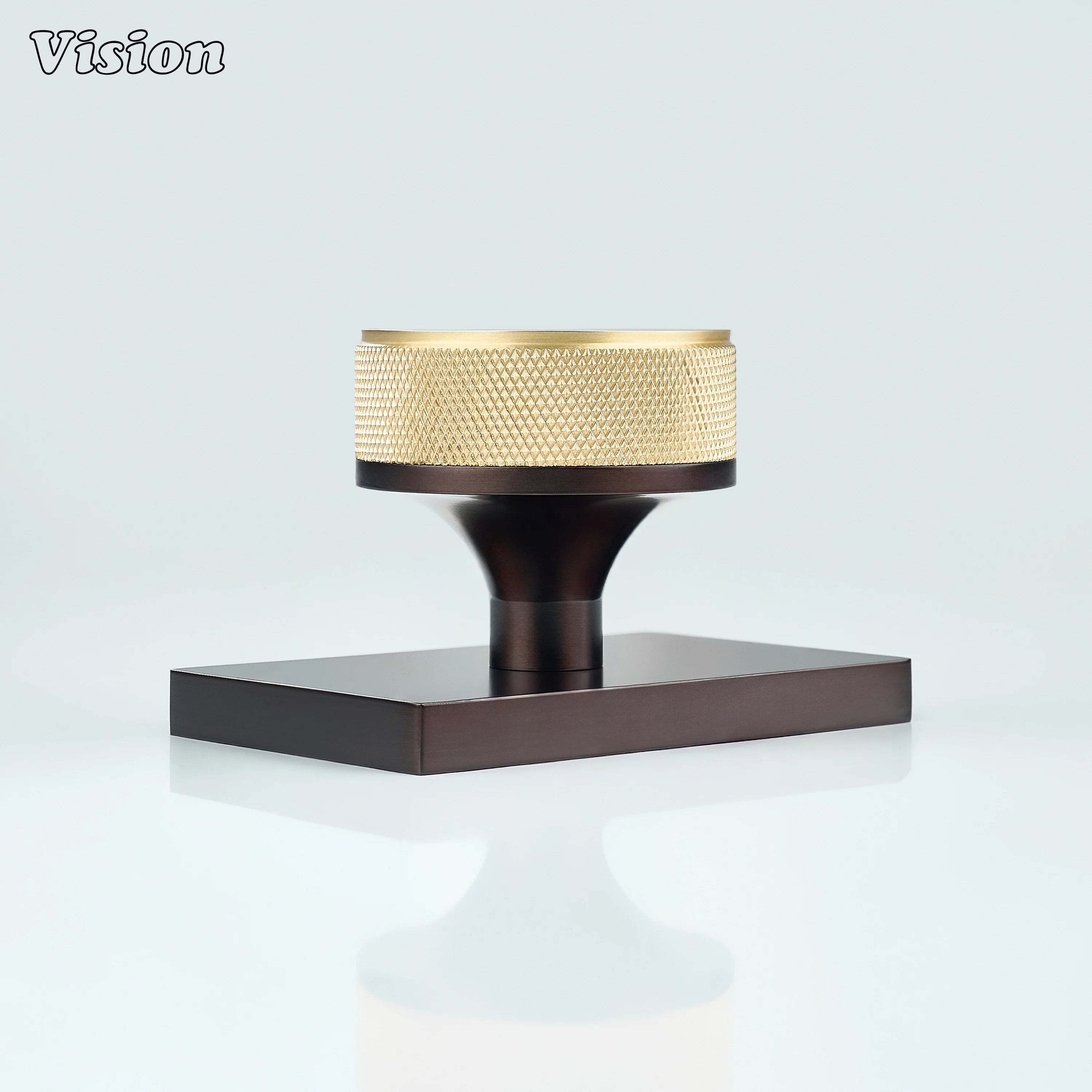 Gold and Oil Rubbed Bronze knurled door knob designed for industrial interiors