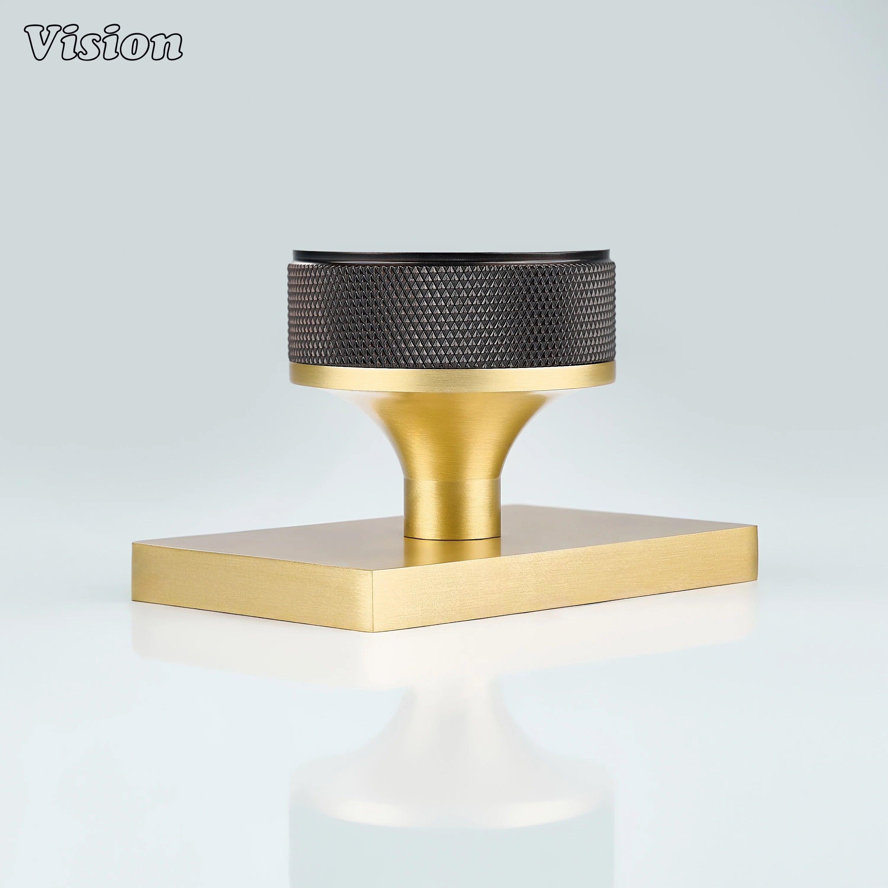 Oil Rubbed Bronze and Gold door knob with knurled grip and gold conceal plate
