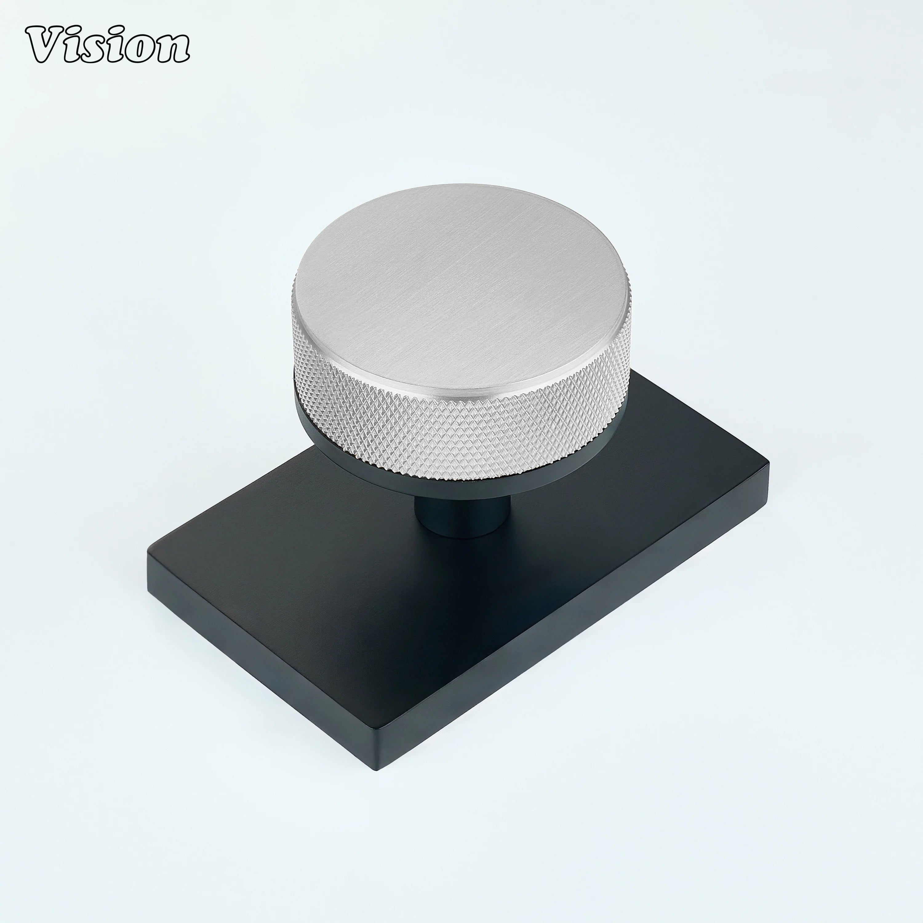 Silver and Black knurled round door knob with silver knob and black rectangular backplate