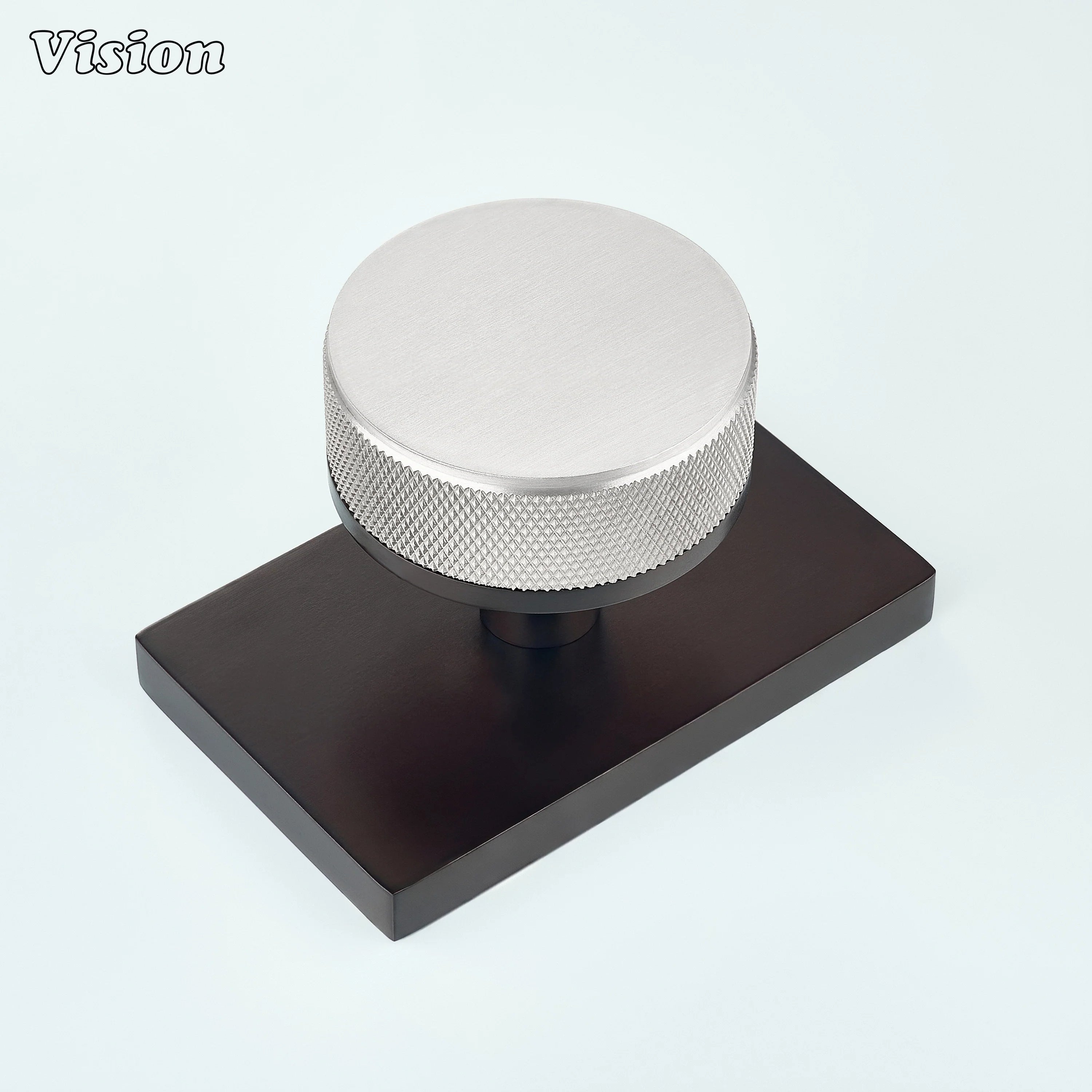 Silver and Oil Rubbed Bronze knurled round door knob with silver knob and oil rubbed bronze backplate