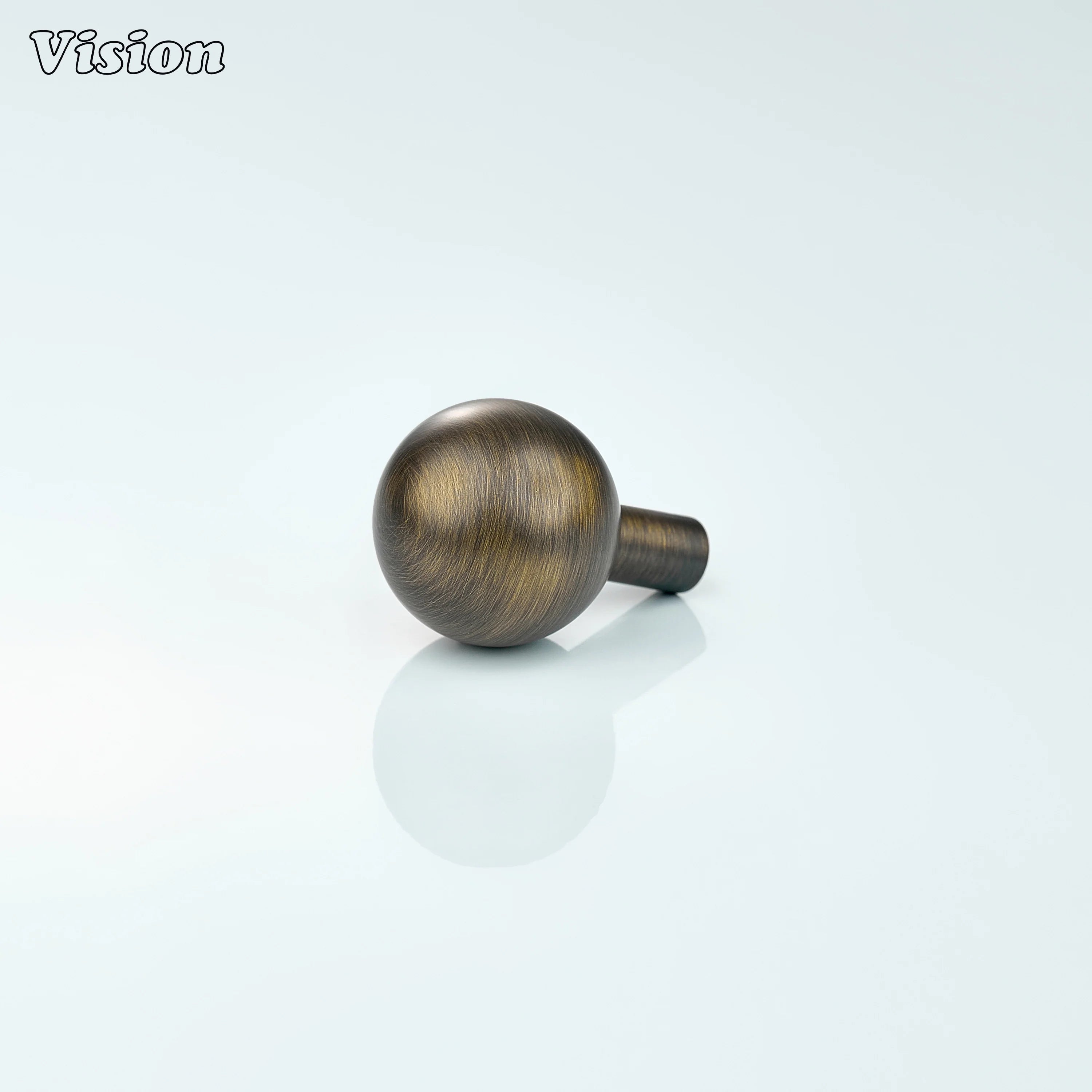 Solid brass cabinet knob with plain round ball design in Antique Bronze for cabinets