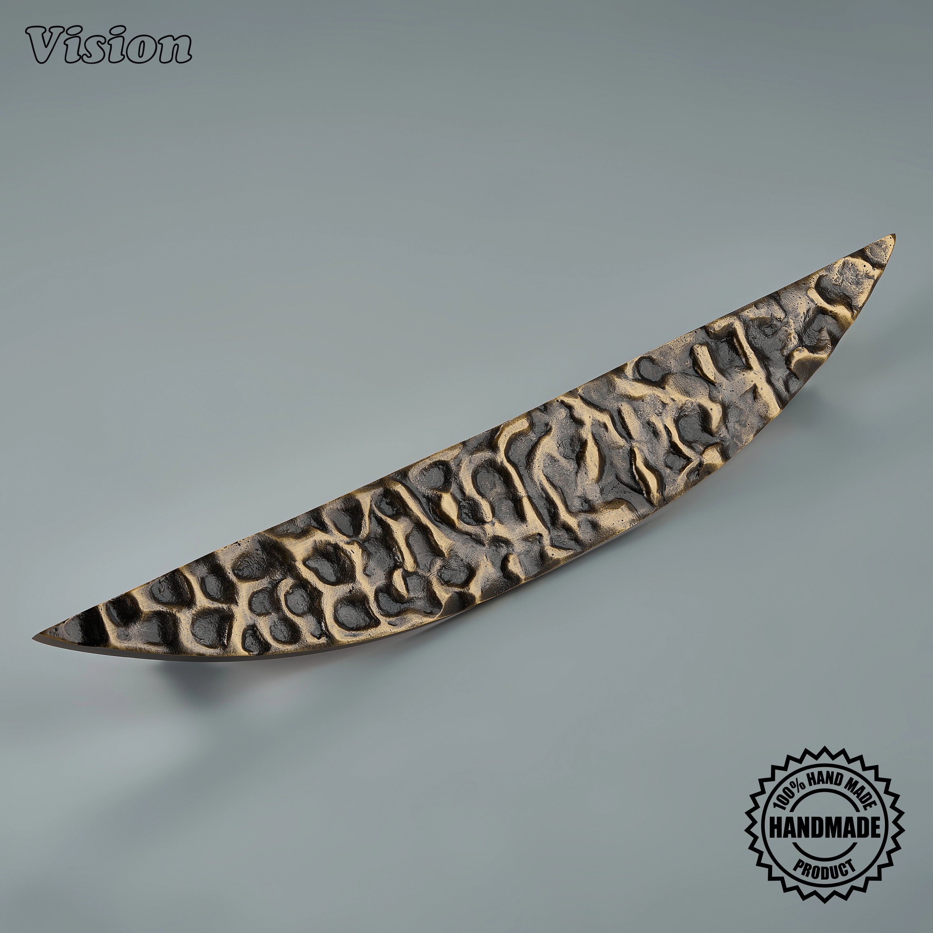 Luna handcrafted door handle with sculpted textured profile in Antique Bronze, shown on a main entry door; its curved silhouette and tapered ends add an artisanal focal point.