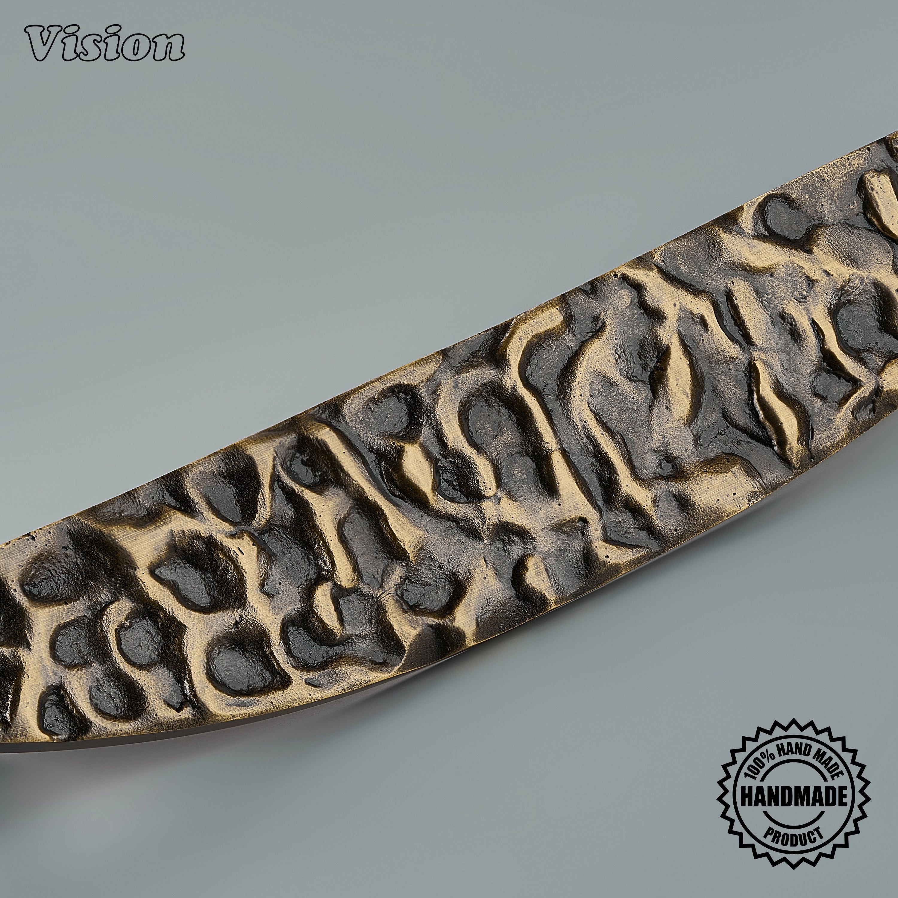 Textured sculpted profile defines this Luna handcrafted door handle in Antique Bronze, with an eclipse-inspired curve and refined tapered tips for a bedroom door.
