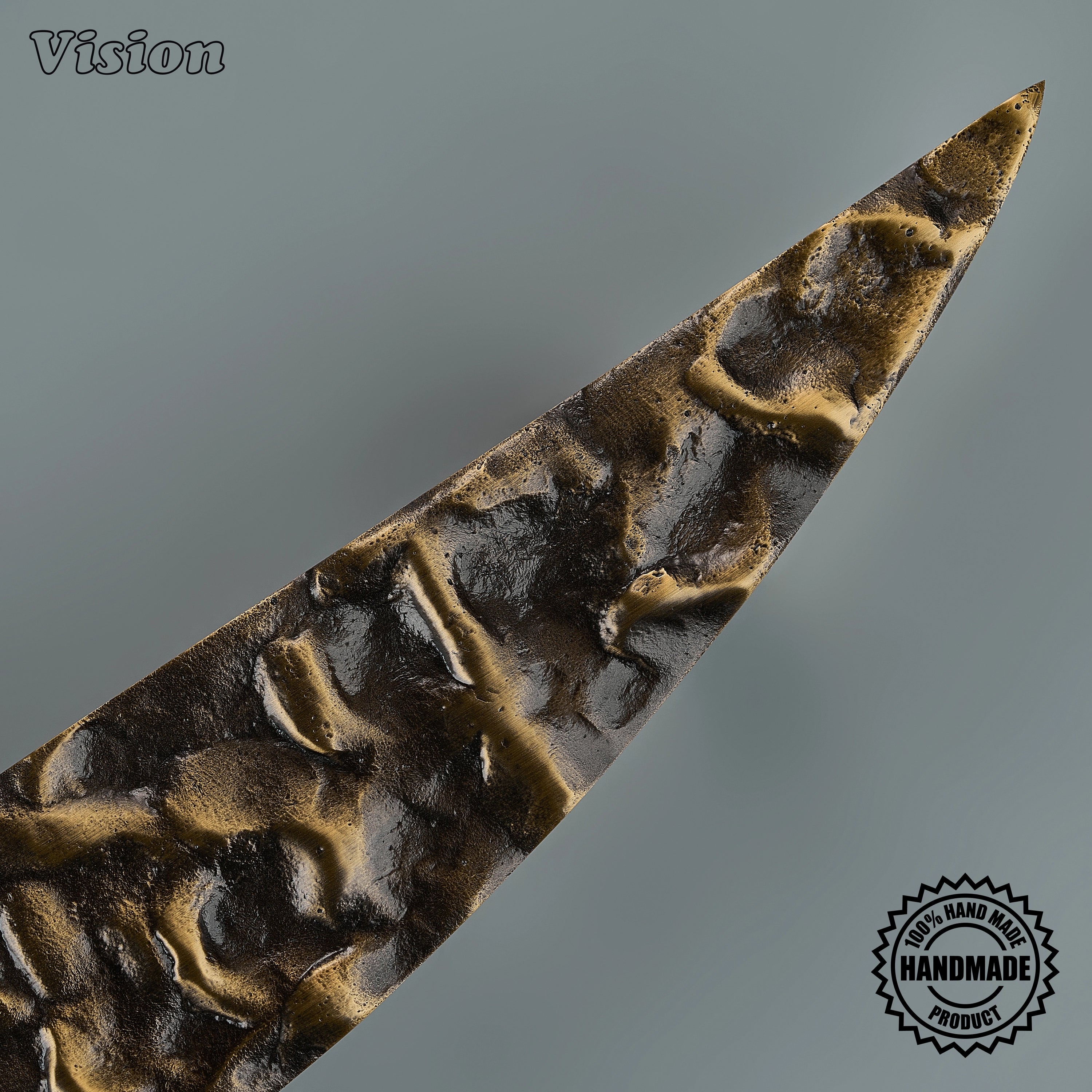 Luna solid brass handcrafted door handle in Antique Bronze has an elongated curved profile, tactile sculpting and tapered tips, complementing a wardrobe door.