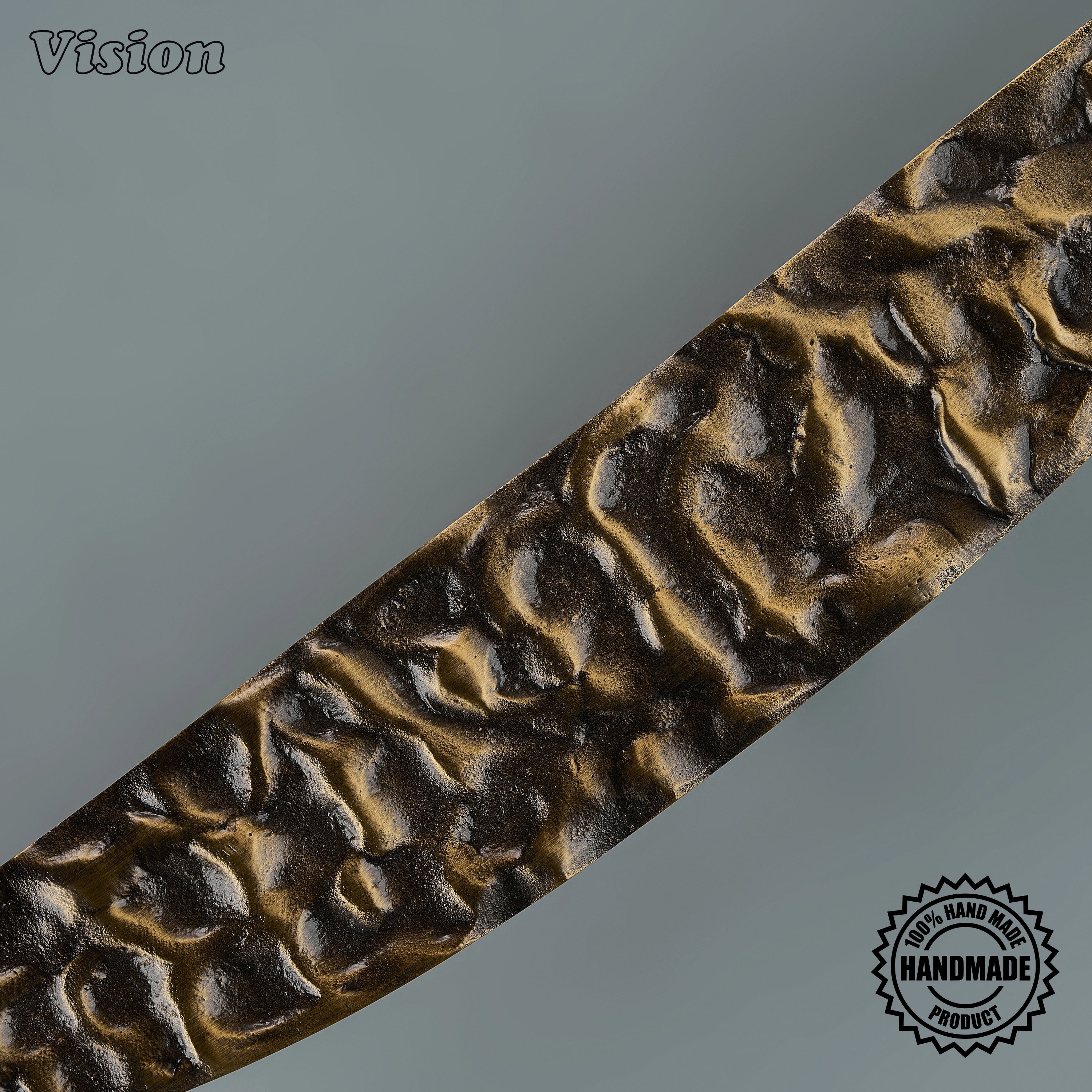 Featuring a sculpted textured profile, Luna door handle in Antique Bronze follows an elegant arc with pointed ends, adding artisanal character to a home office door.
