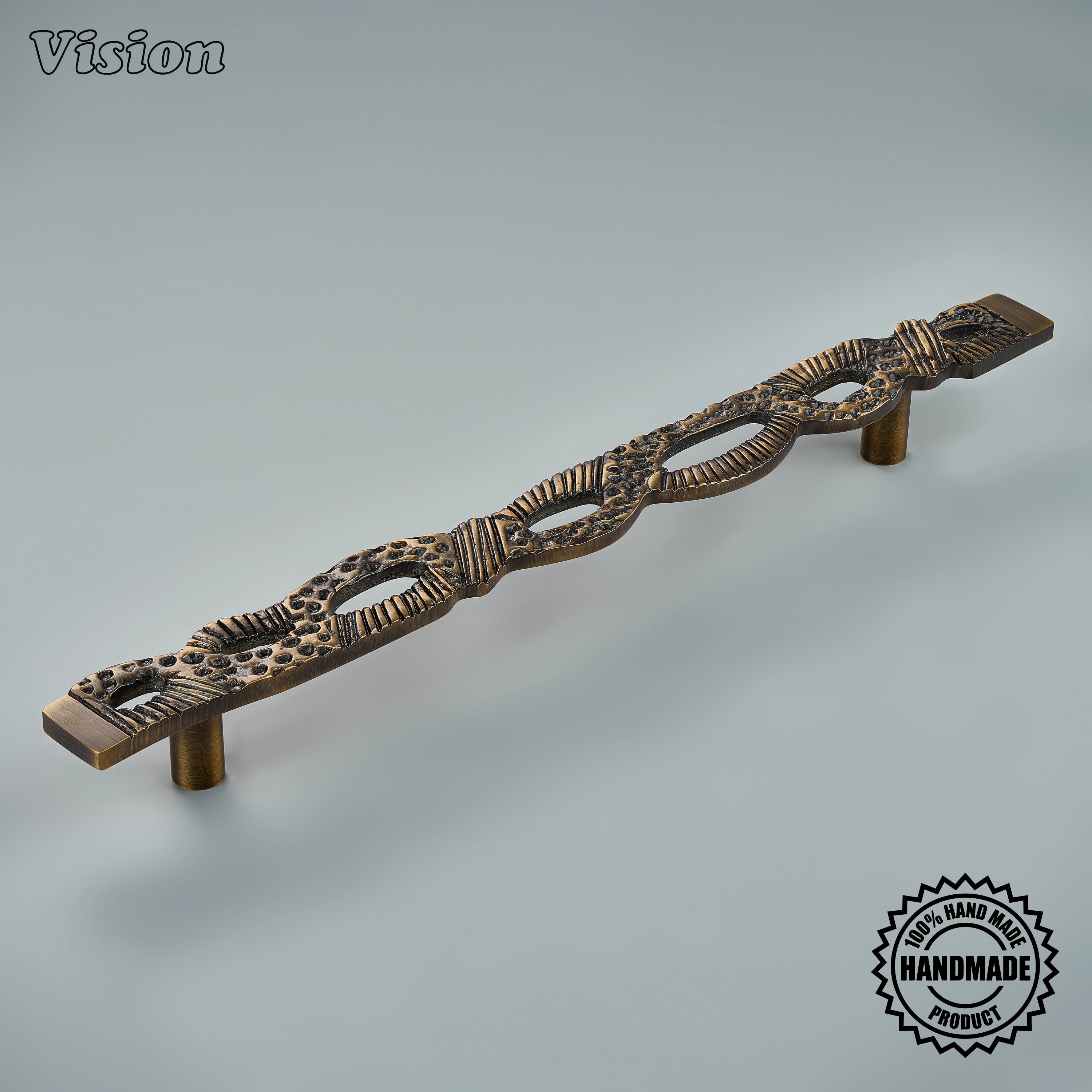 Antique Bronze handcrafted appliance pull with interwoven open loop texture on tall custom pantry doors
