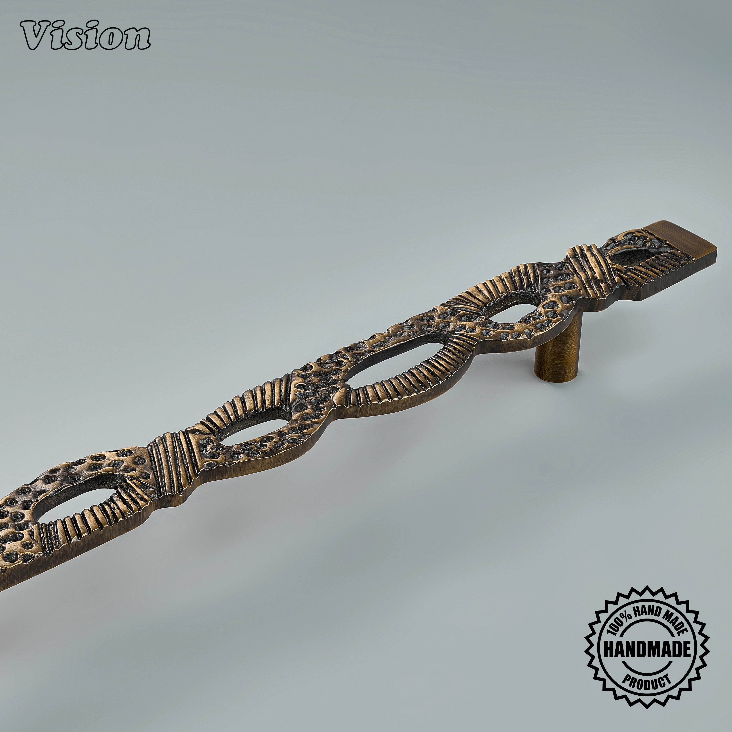 Antique bronze artisanal door handle with tactile knotted surface for heavy interior double doors