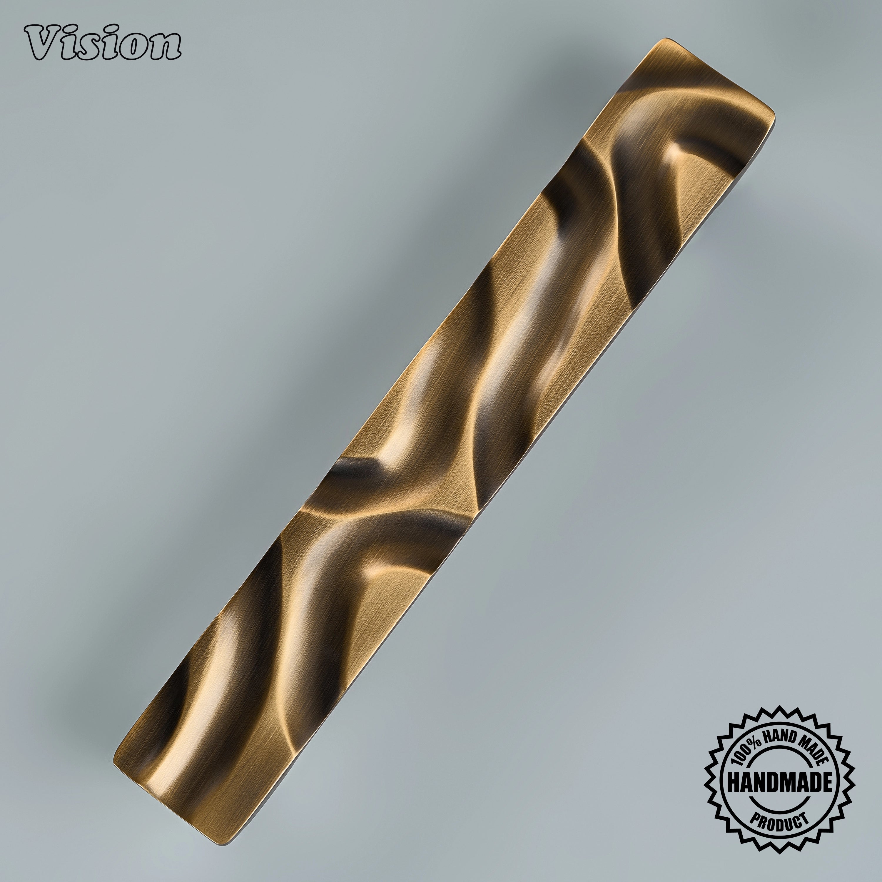 Luxury antique bronze sculpted brass pull with round mounting posts on integrated dishwashers