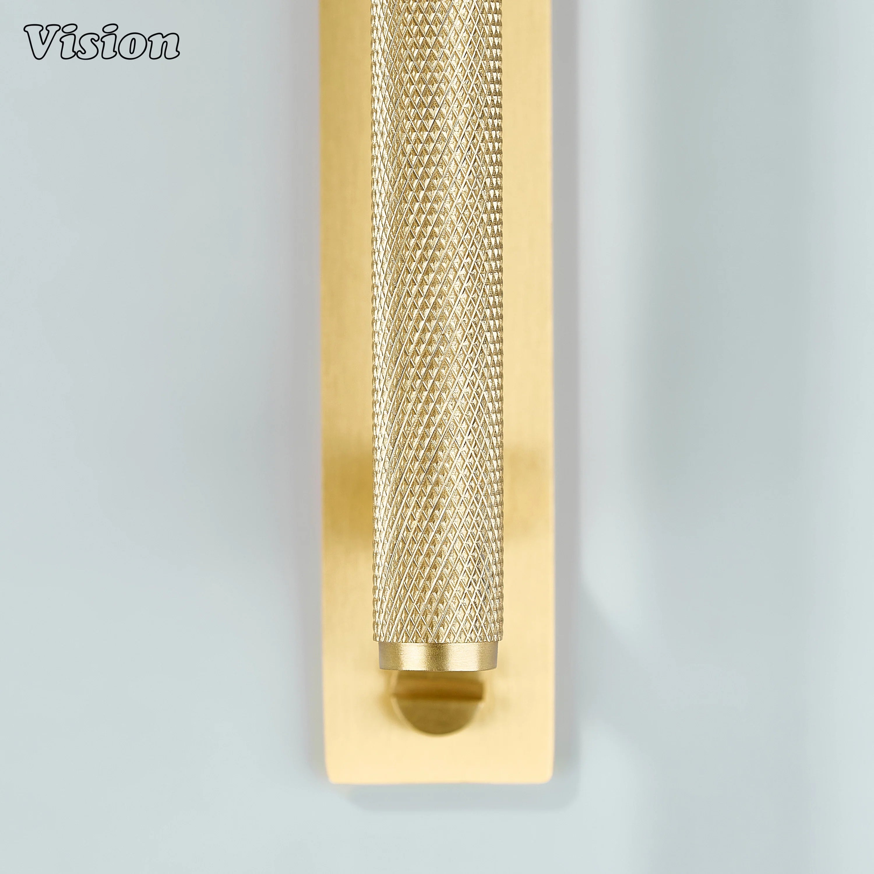 Knurled Gold cabinet handle highlighting textured grip for furniture