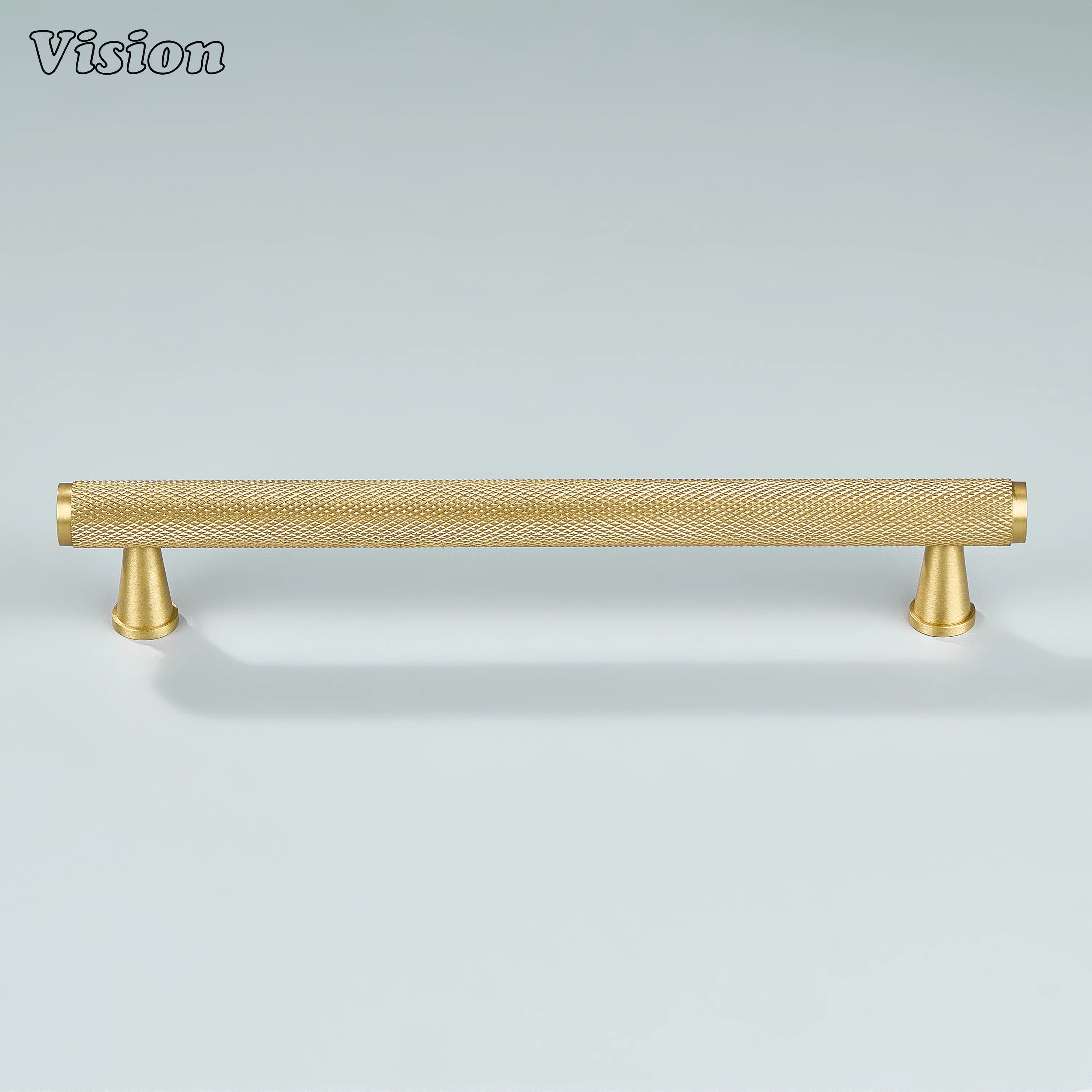 Gold knurled brass handle for cupboards and storage units.