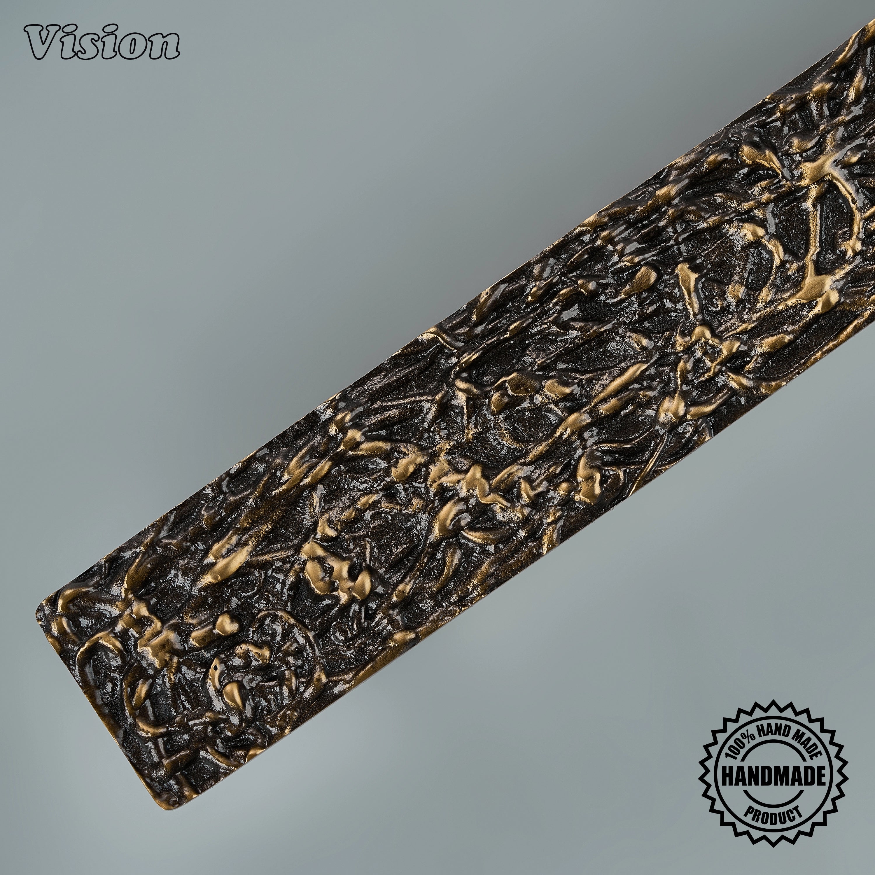 Handcrafted antique bronze appliance pull with organic nest relief on oversized entryway doors