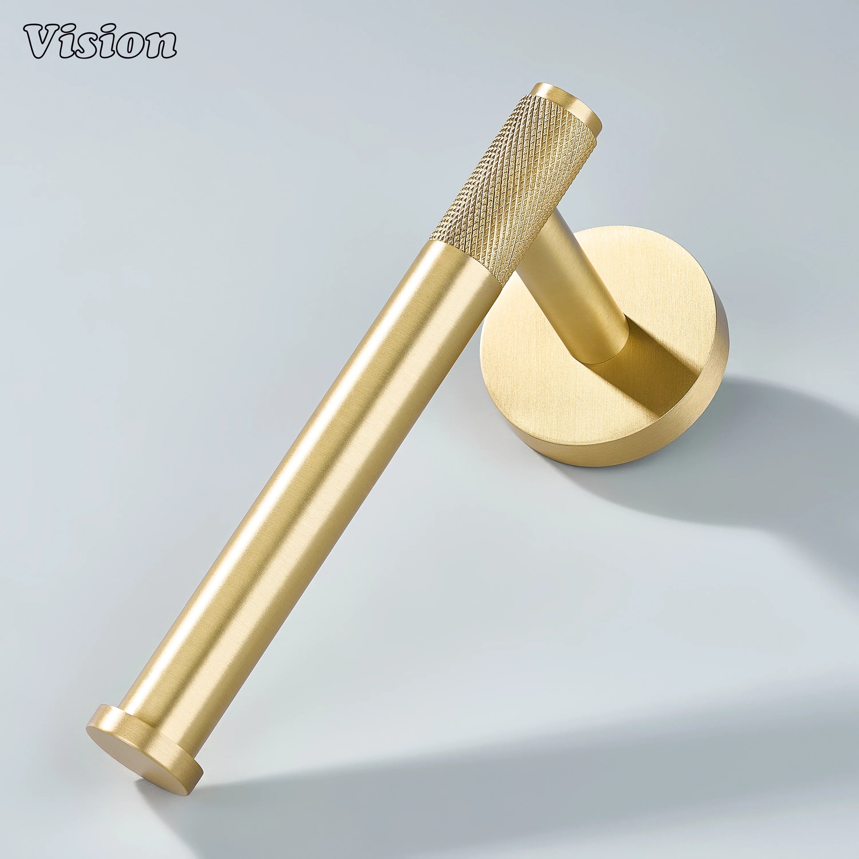 Gold brass toilet paper holder with knurled bar and round wall mount for modern bathrooms