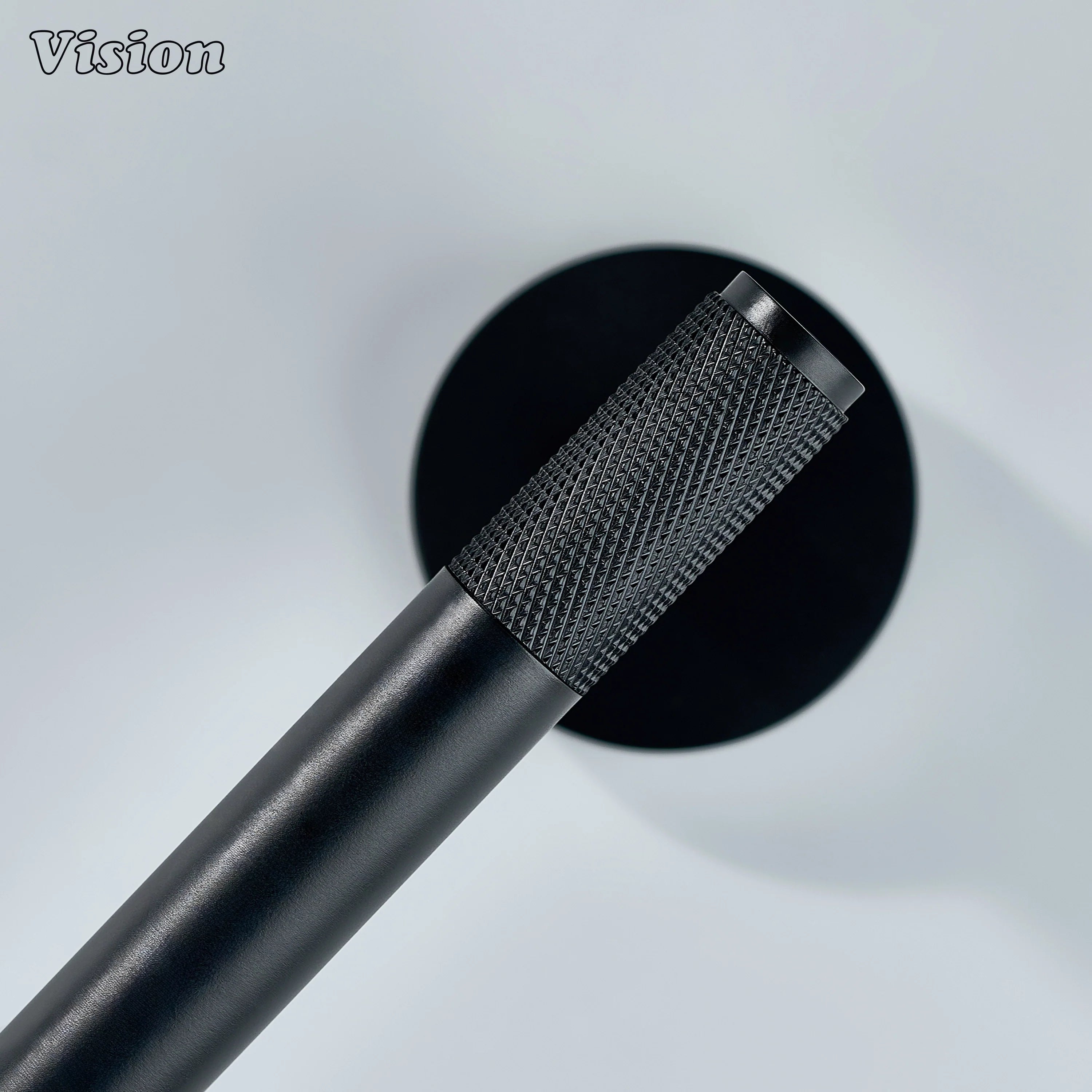 Contemporary black brass towel holder with round wall mounting plate