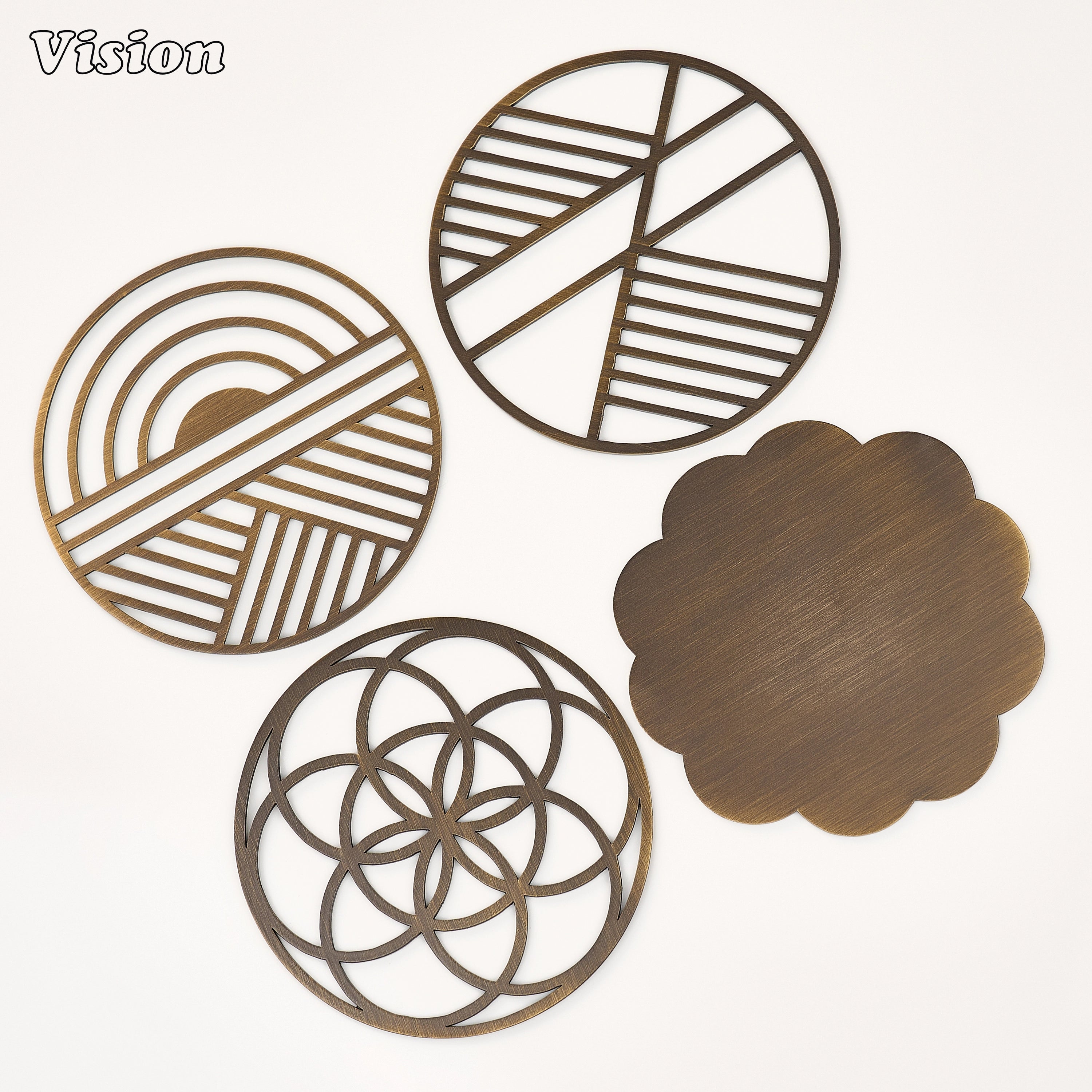 Premium antique bronze precision-cut brass coaster with intersecting framework on a coffee table