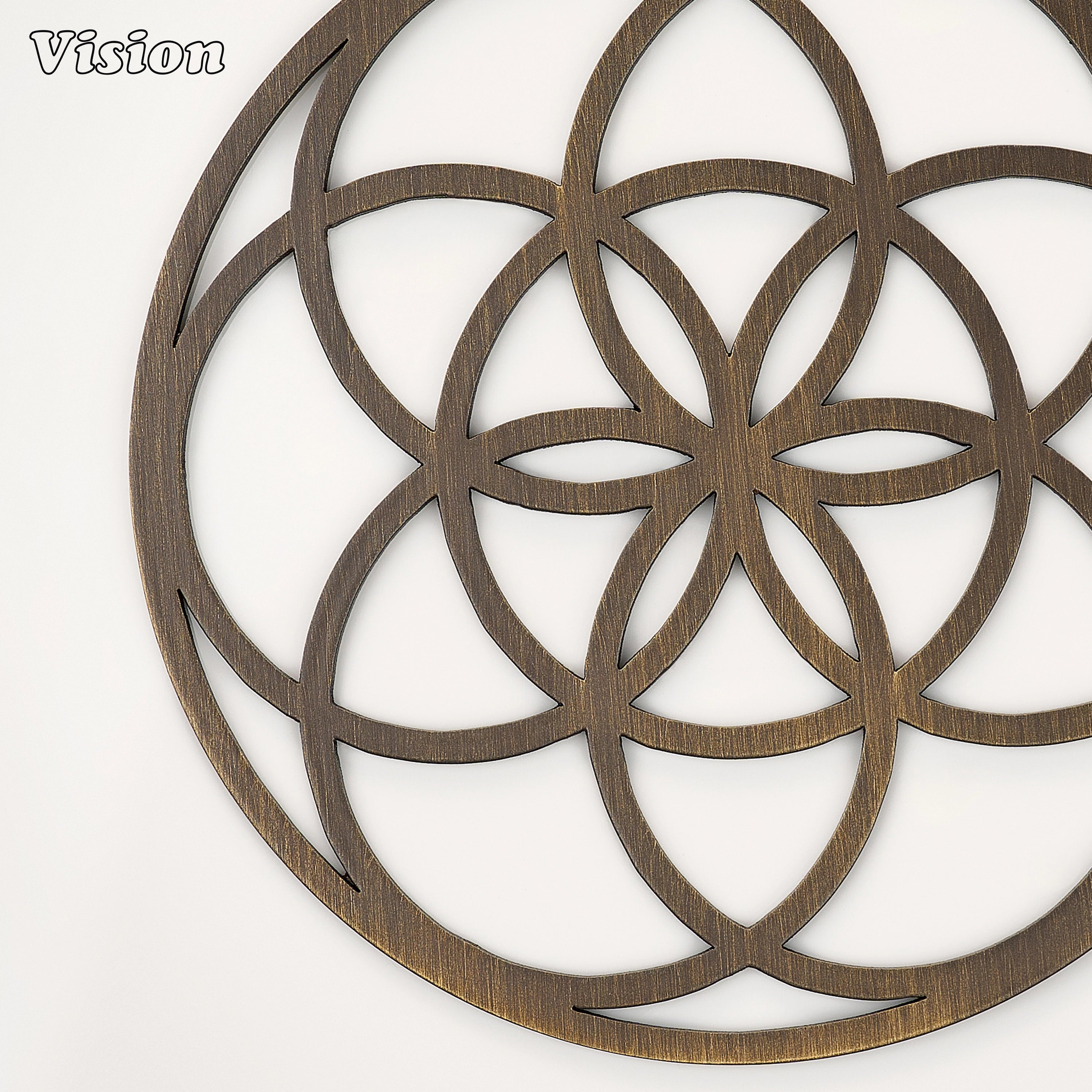 Sleek antique bronze solid brass drink coaster with sacred geometry on a contemporary office desk