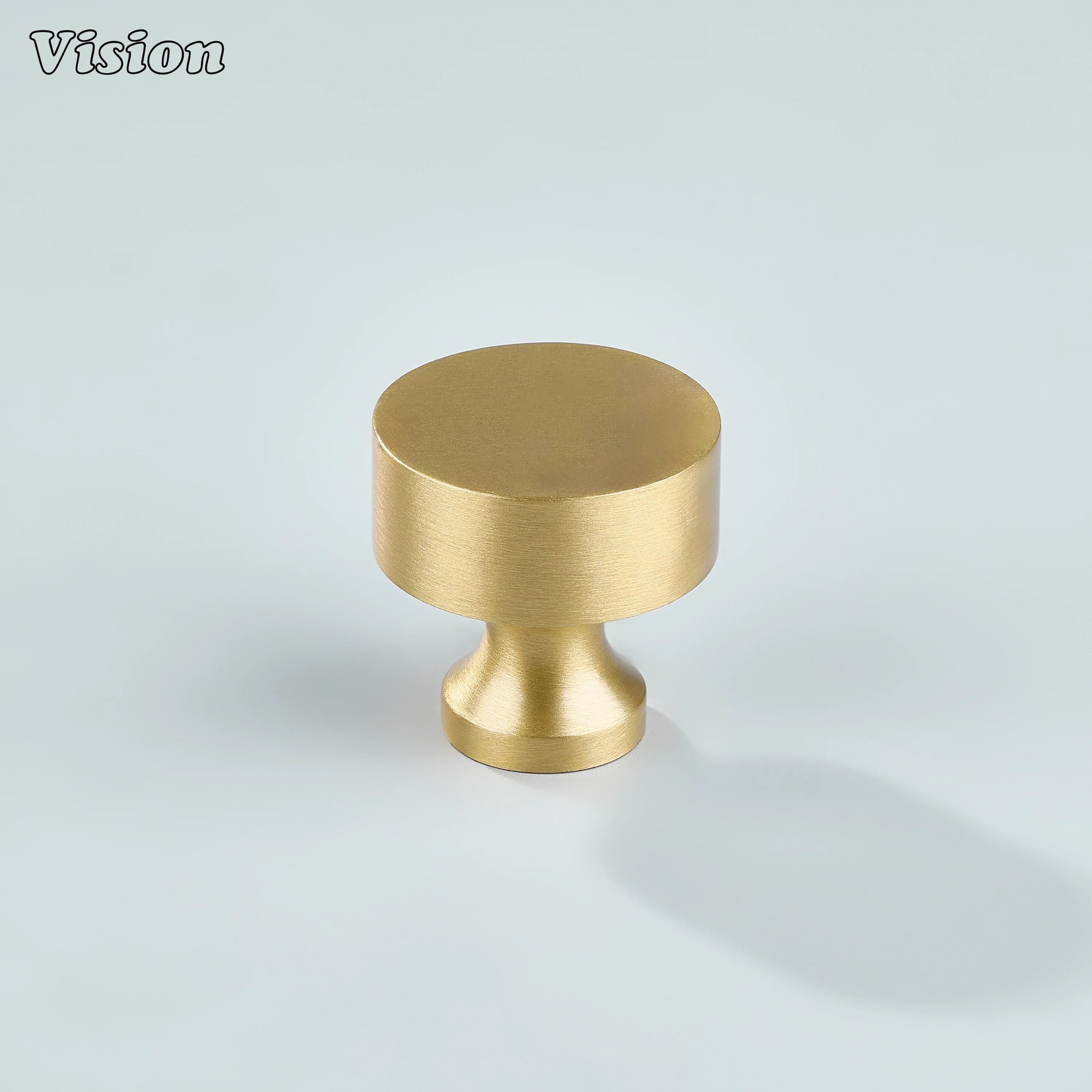 Plain round gold cabinet knob suitable for drawer fronts and furniture units