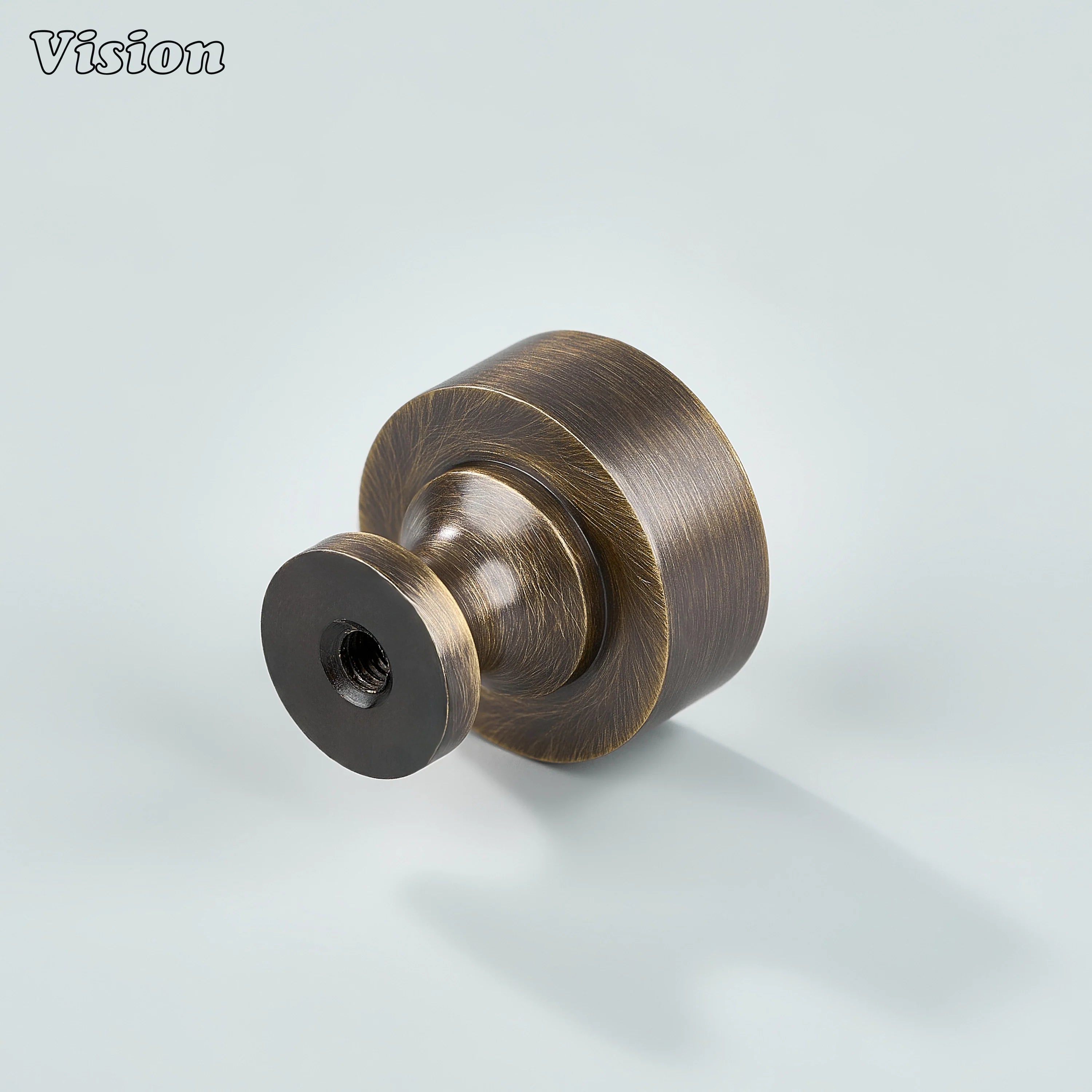 Small round Antique Bronze cabinet knob used on wardrobe doors