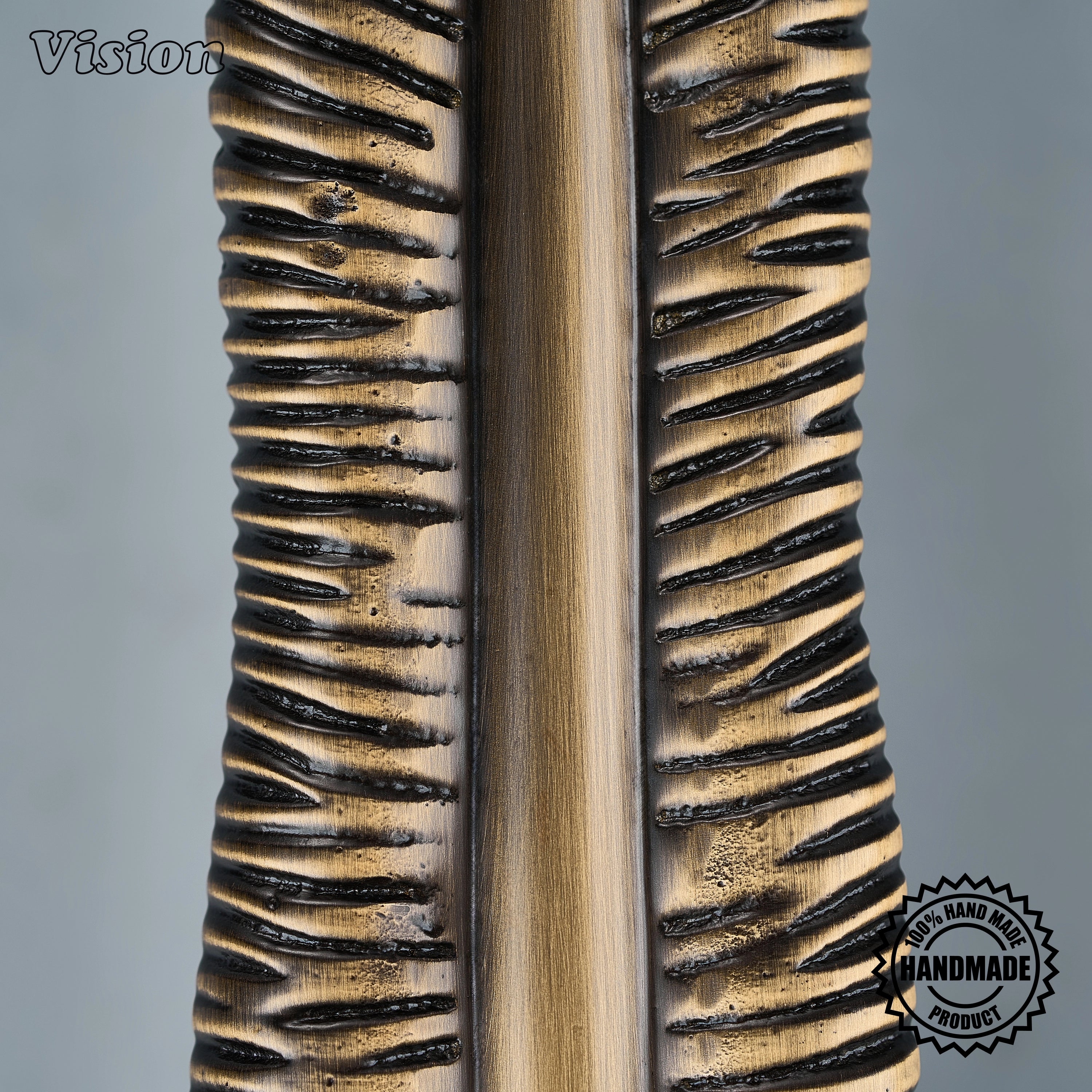 Antique Bronze cabinet handle with detailed feather design for bespoke furniture and wardrobes.