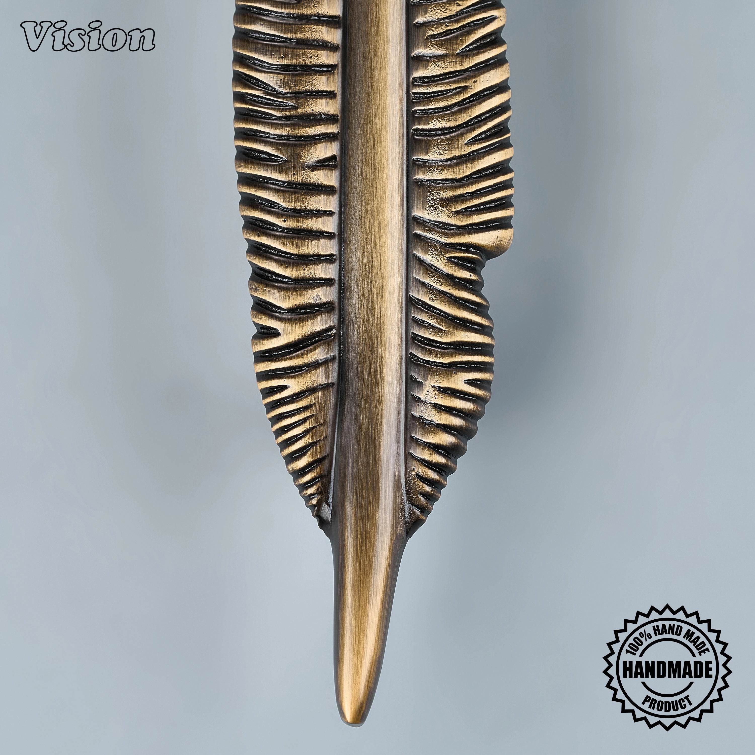 Antique Bronze solid brass appliance handle with elegant feather detailing for luxury kitchen furniture.