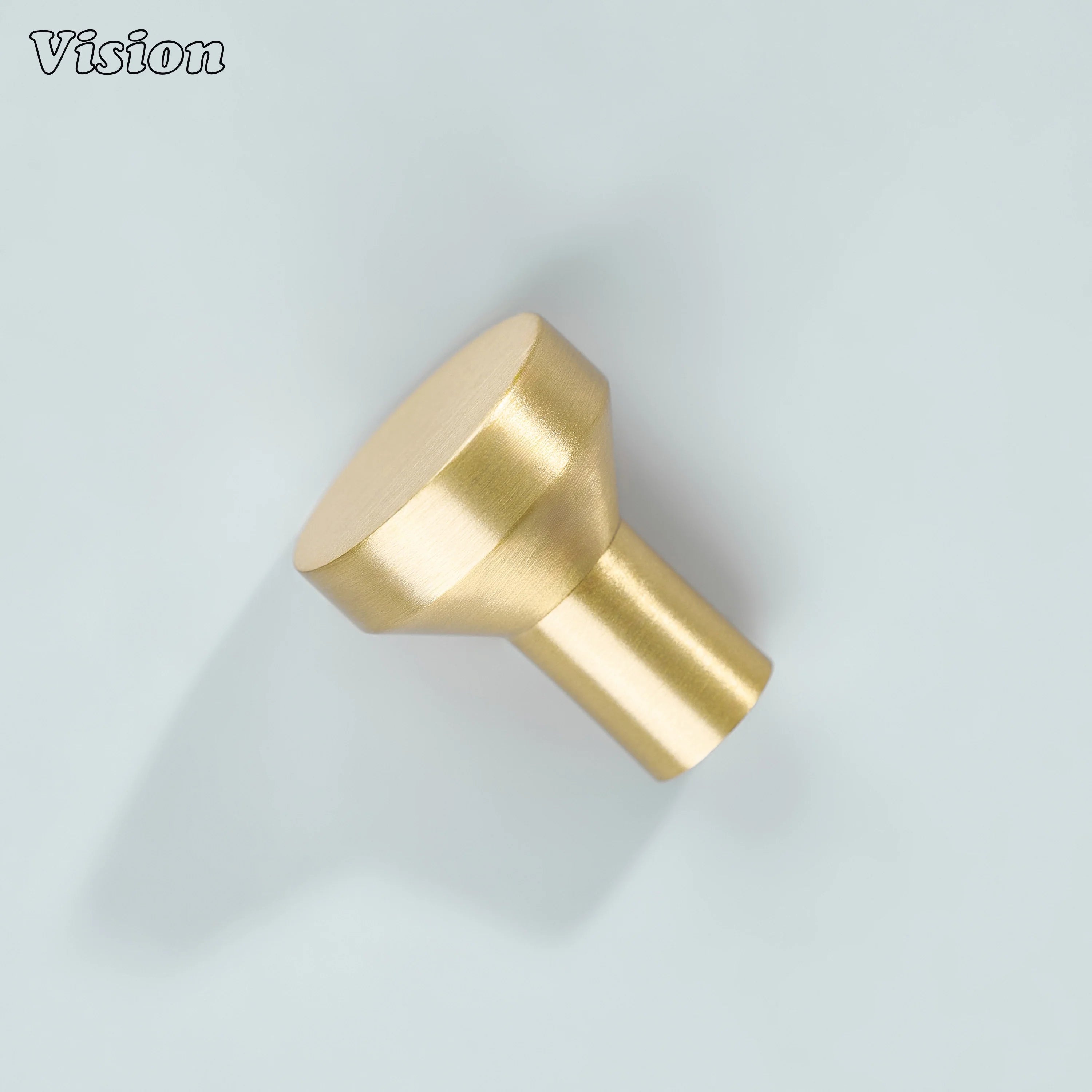 Gold small cabinet knob with round flat top and tapered base for wardrobe cabinets