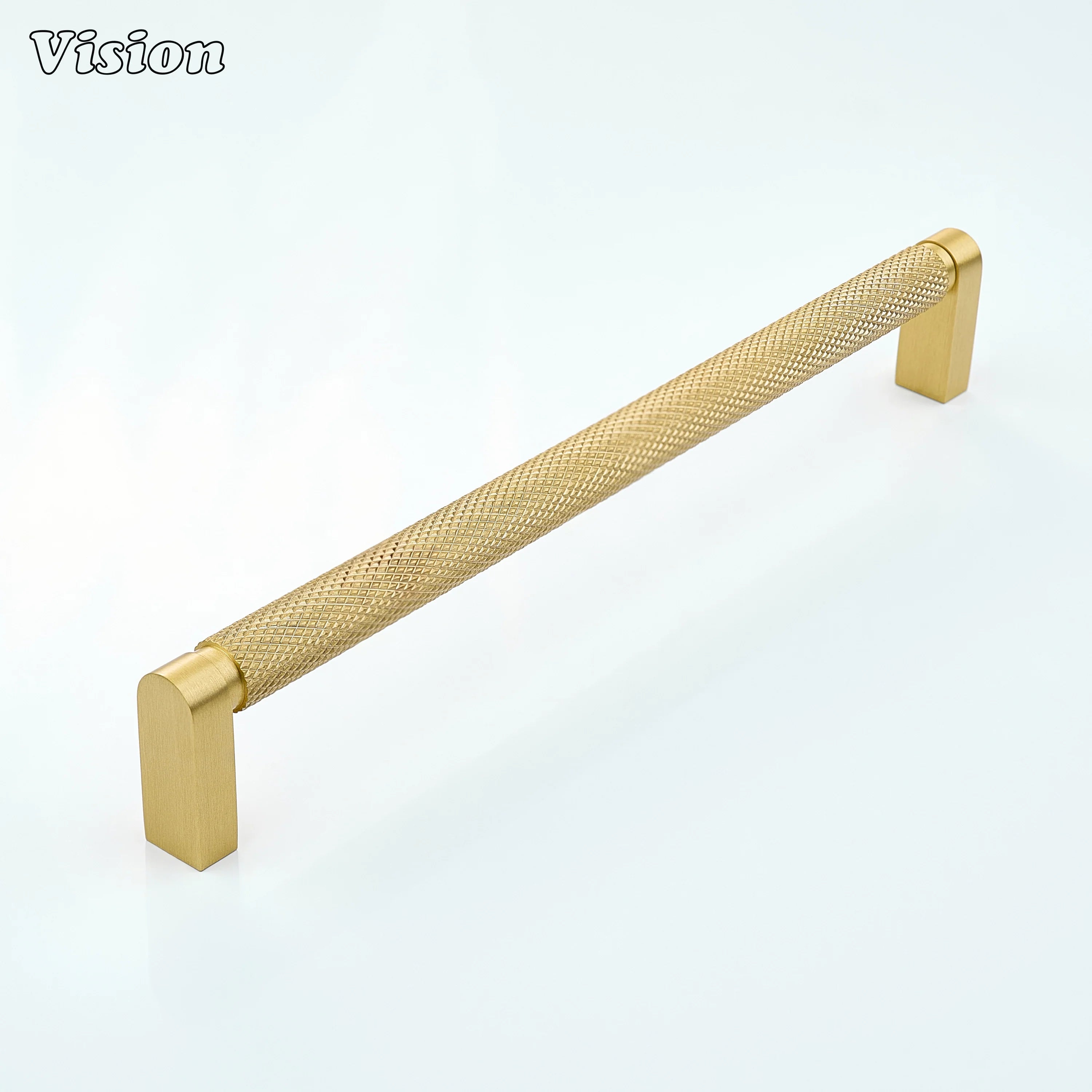 Gold ripple knurled cabinet handle fitted on dresser drawers.