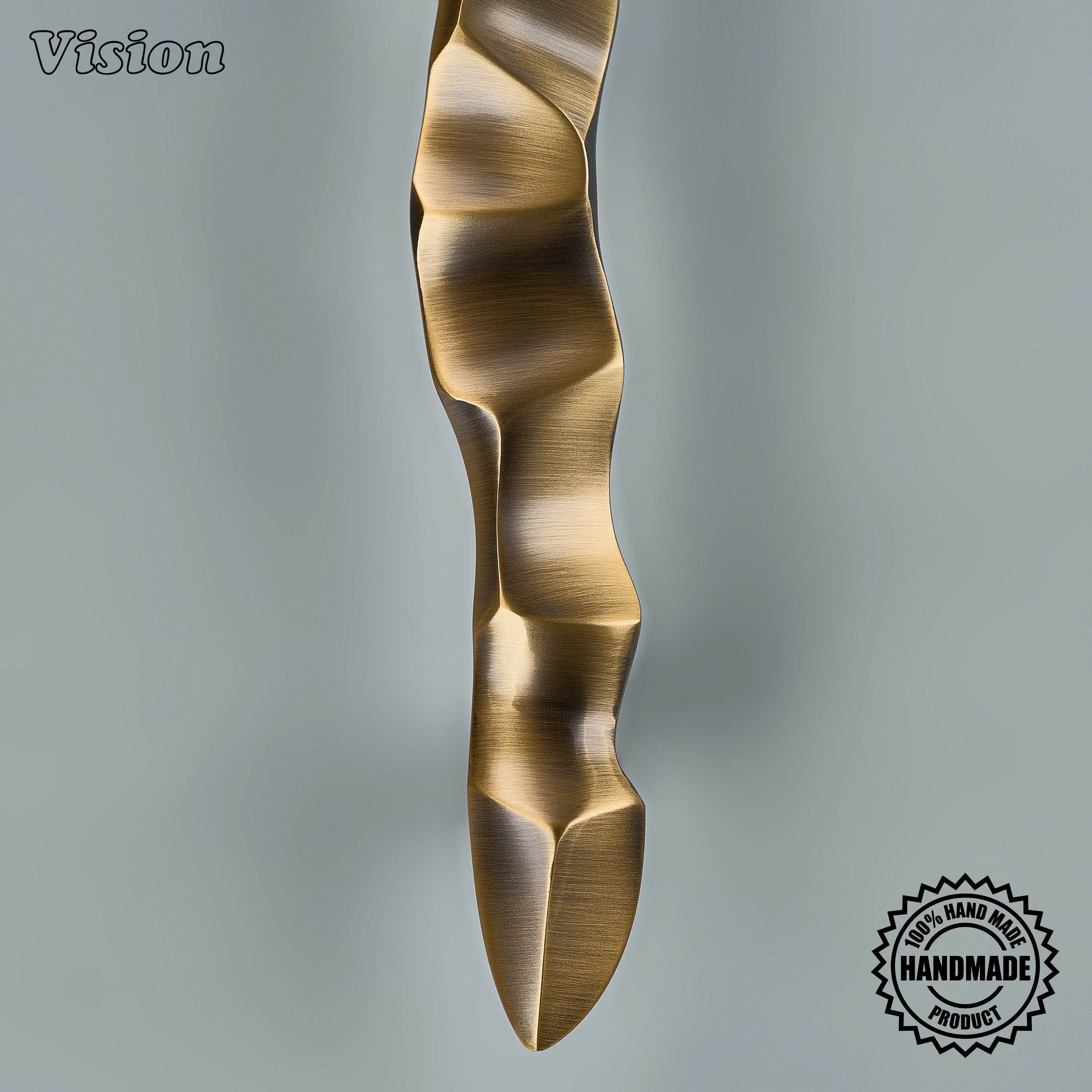 Premium antique bronze sculpted appliance handle with round posts on custom built-in freezers