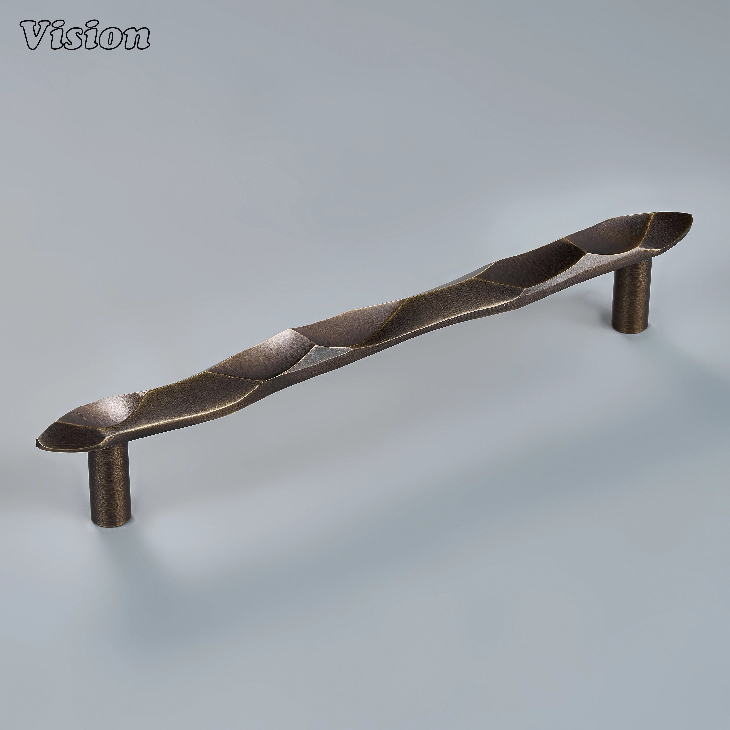 Sculpted antique bronze cabinet handle with flowing wave ridges on custom statement drawers