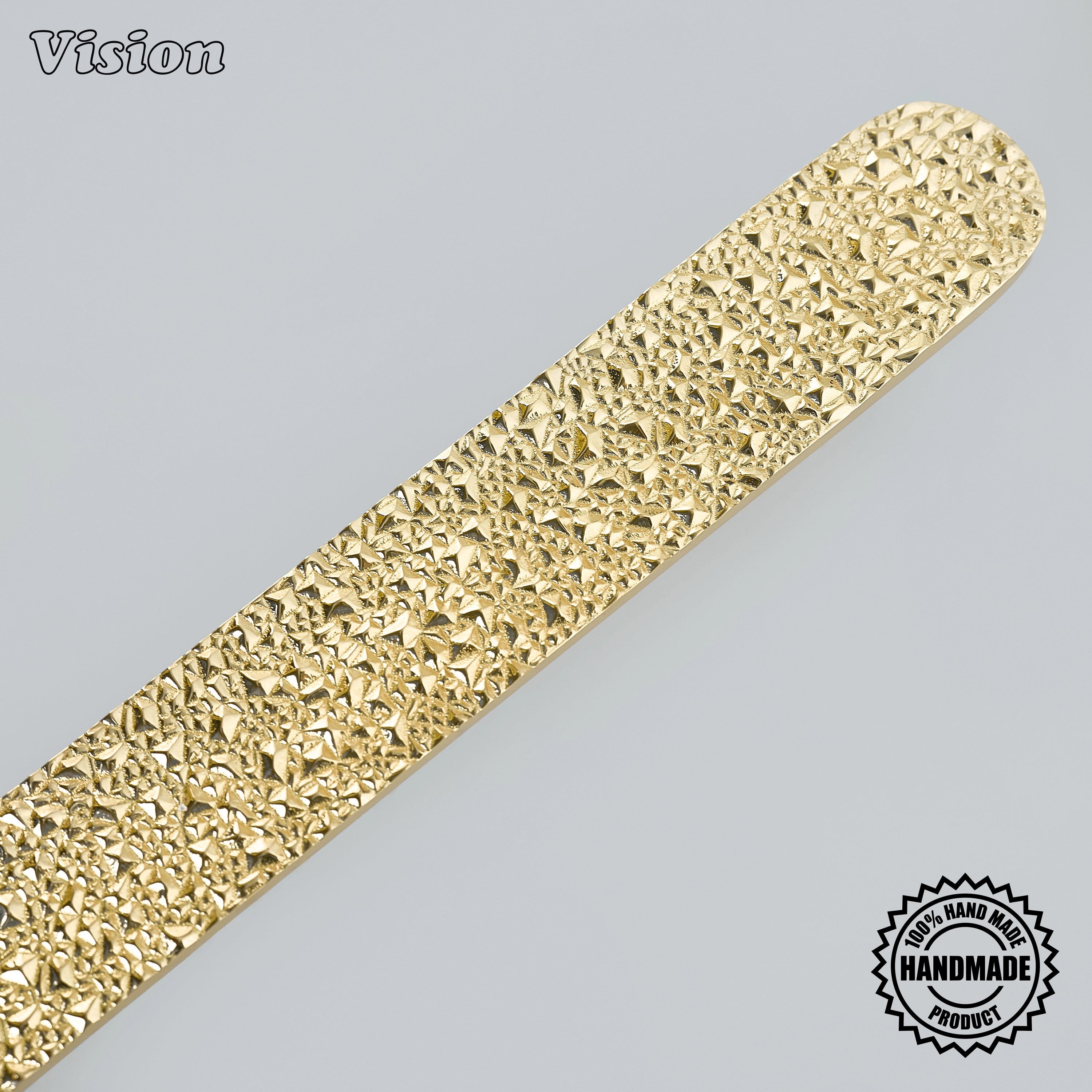 Handcrafted appliance pull in polished brass finish featuring a heavily textured bar for wardrobes