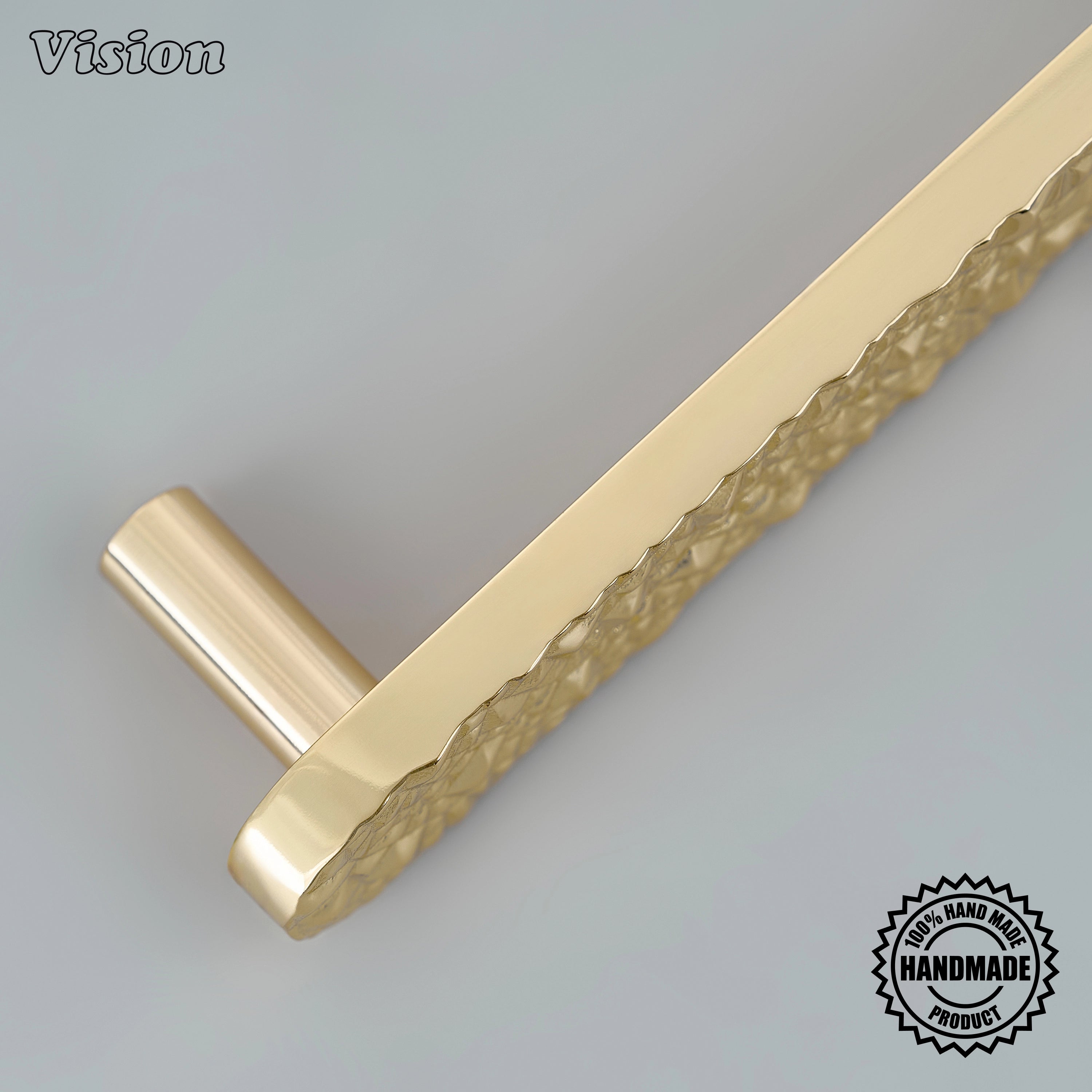 Handcrafted cabinet pull in polished brass finish featuring a heavy textured bar for wardrobes