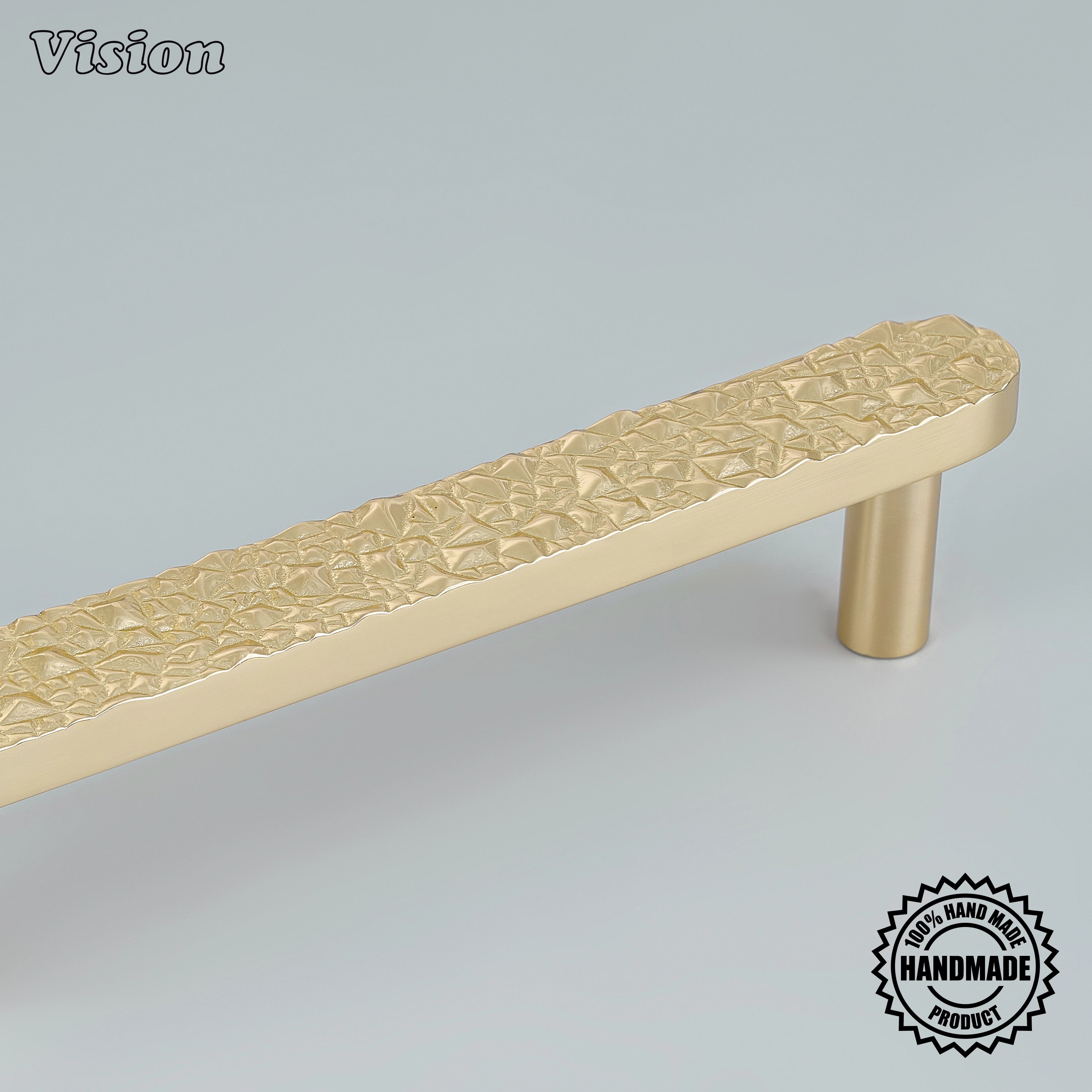Premium polished brass sculpted brass cabinet pull with round mounting posts on bathroom vanities