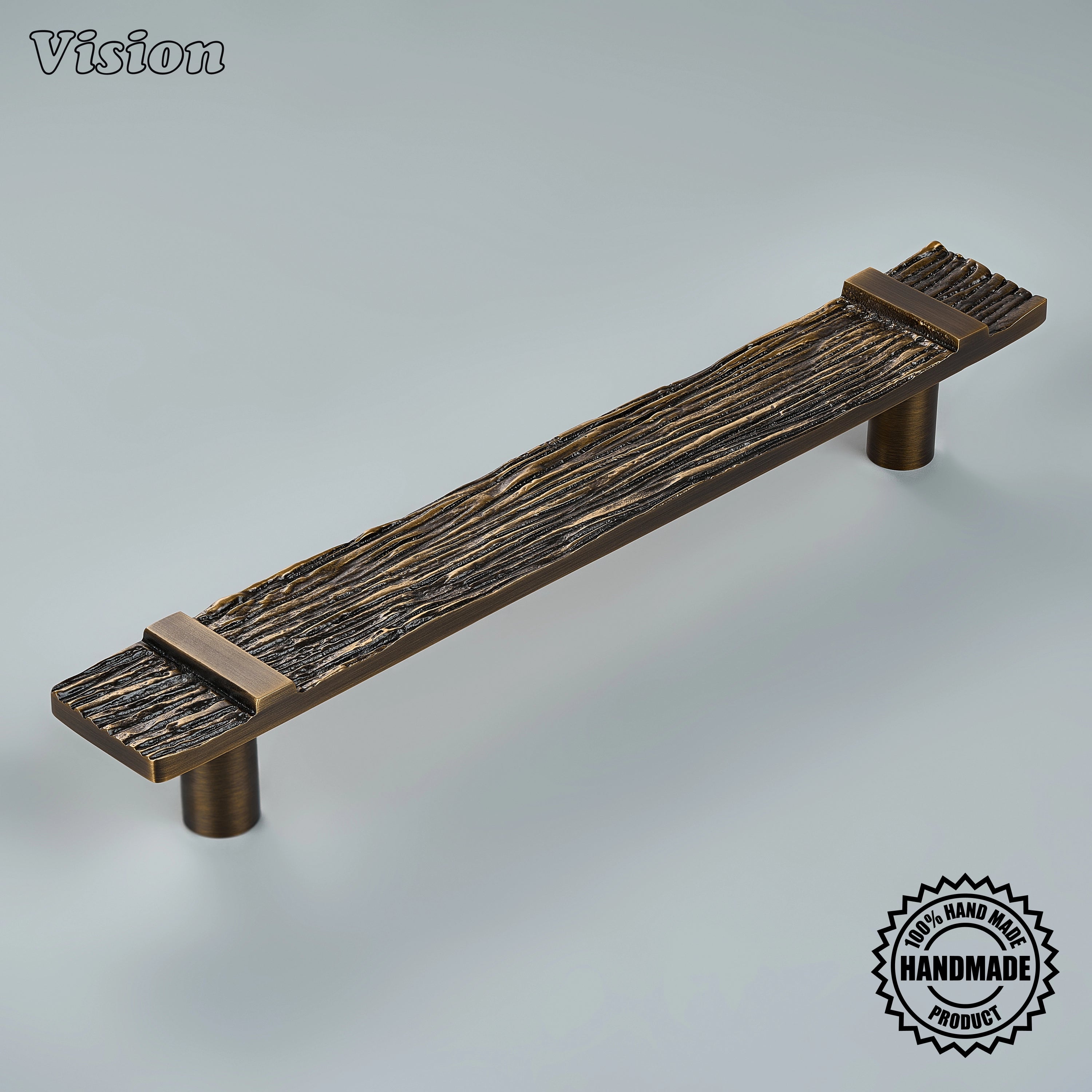 Antique Bronze handcrafted appliance pull with deeply carved parallel texture on custom pantry doors