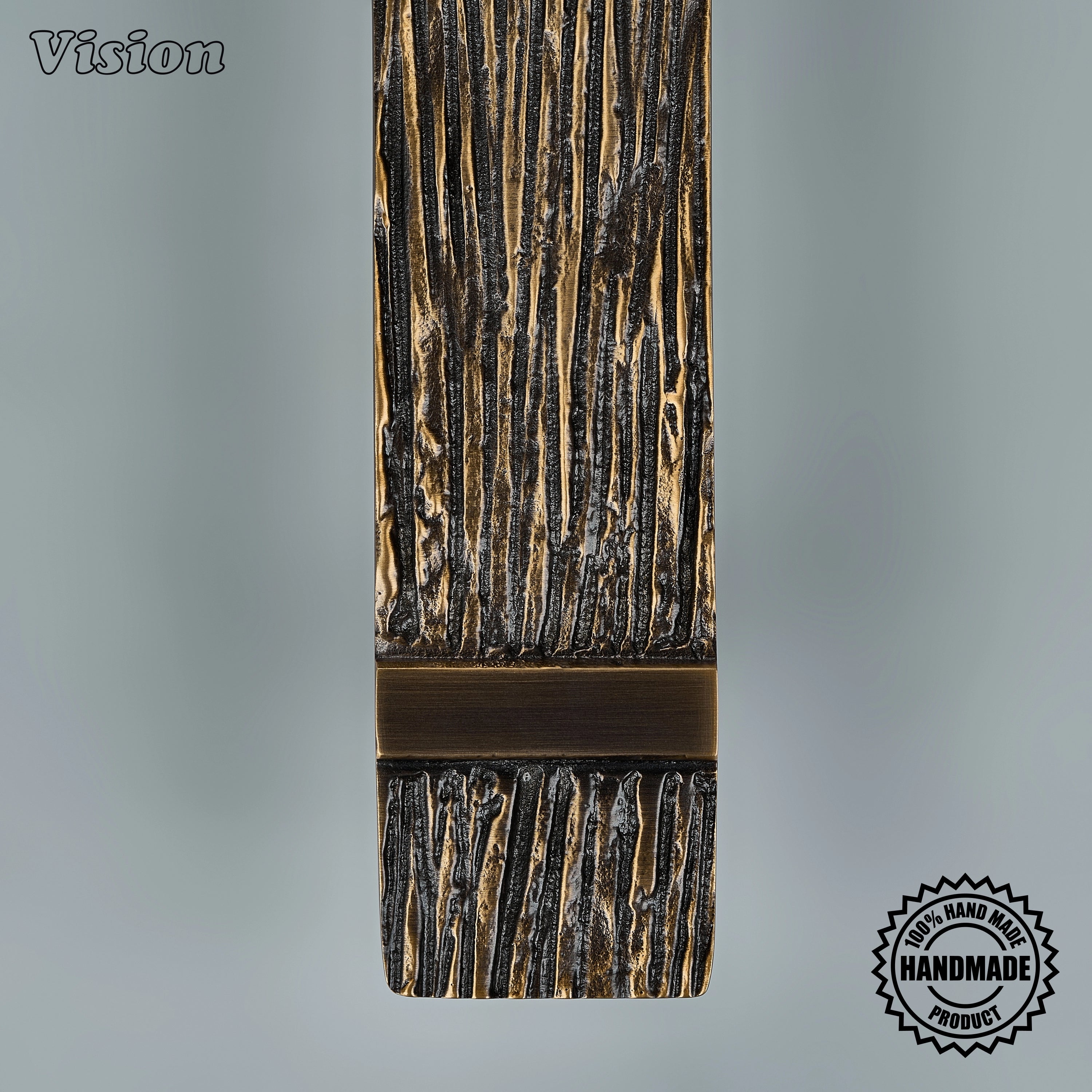 Solid brass antique bronze sculpted appliance handle with heavily textured bar for utility panels