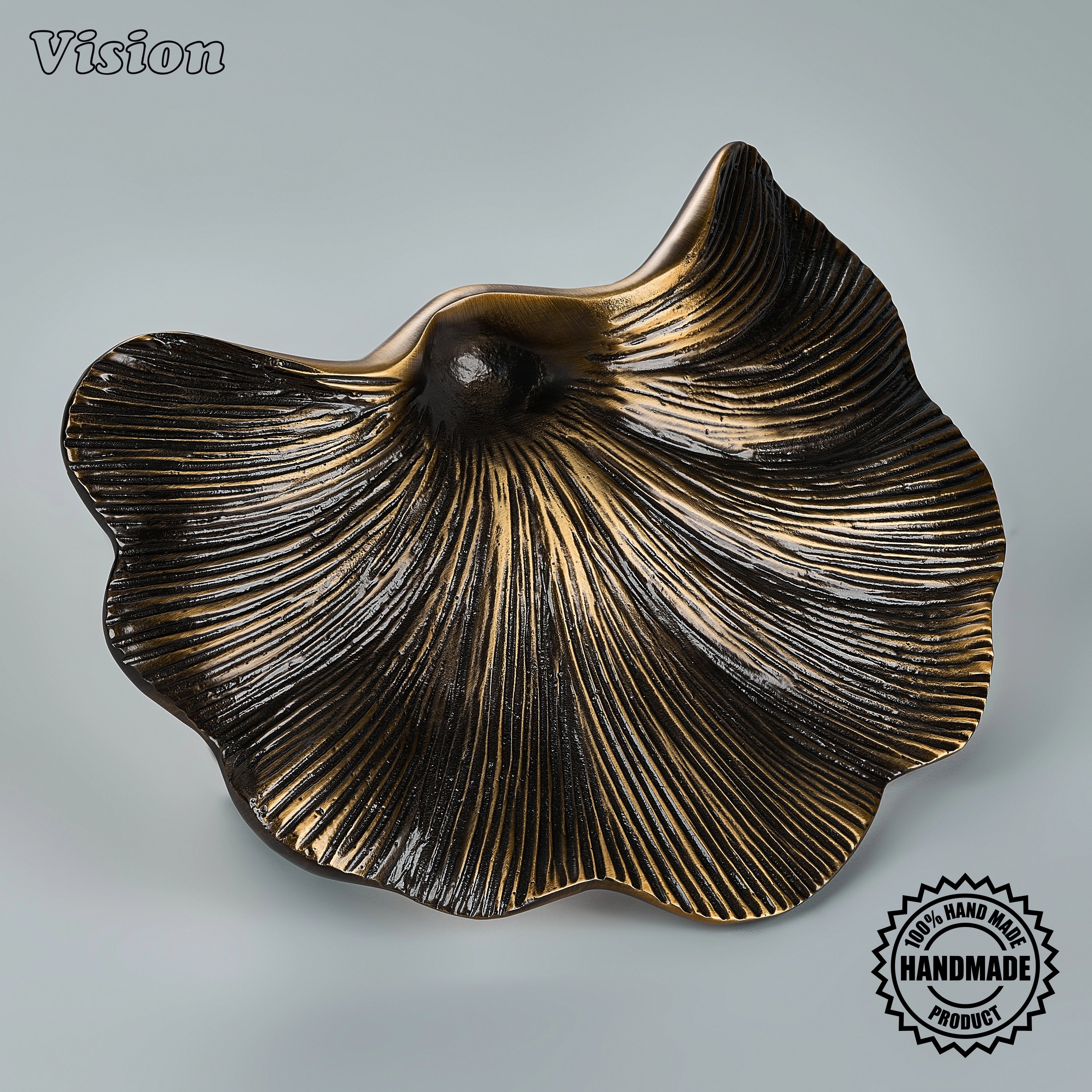 Antique Bronze handcrafted door handle with sculpted radiating ridges on heavy passage doors