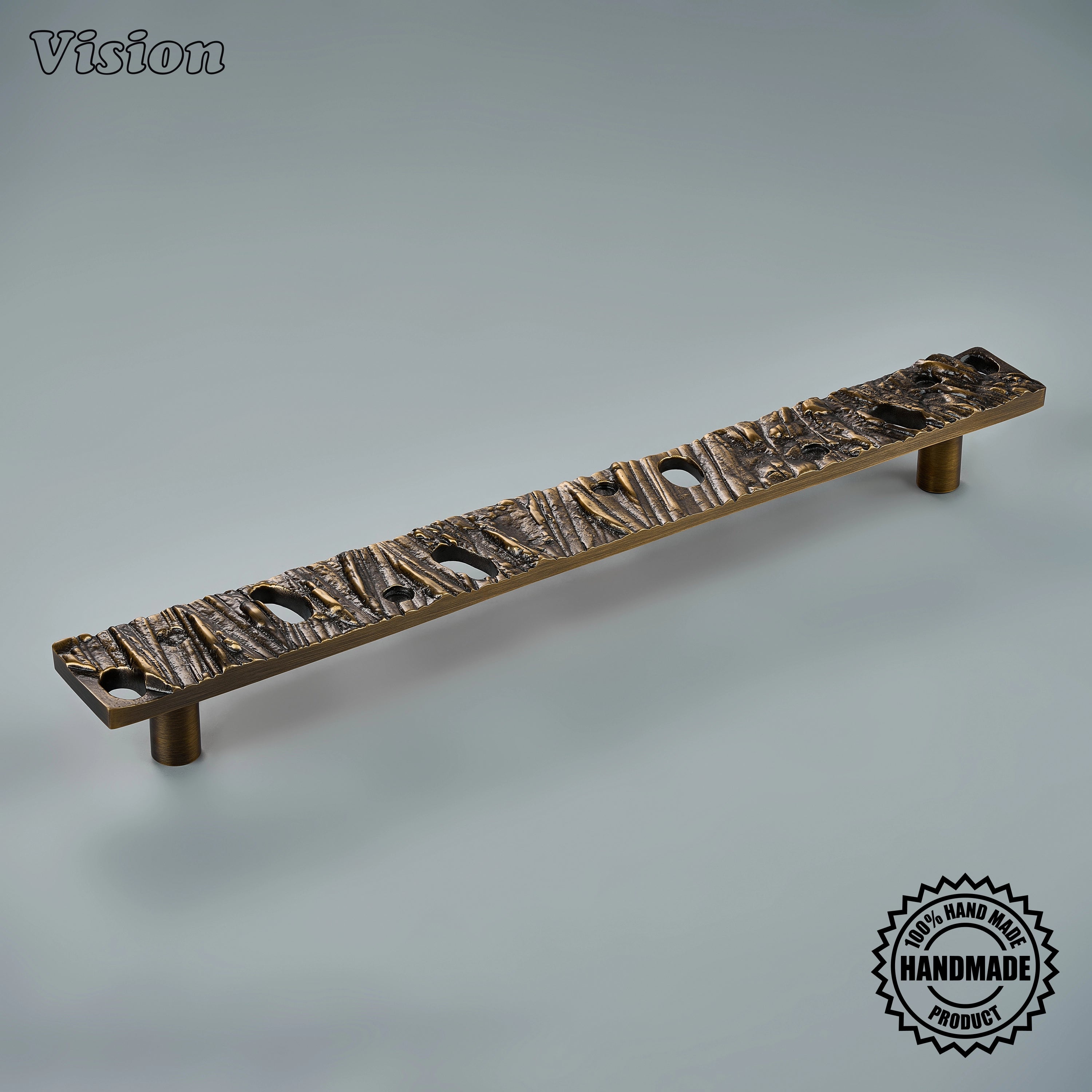 Antique Bronze handcrafted door handle with sculpted organic surface on custom pantry doors