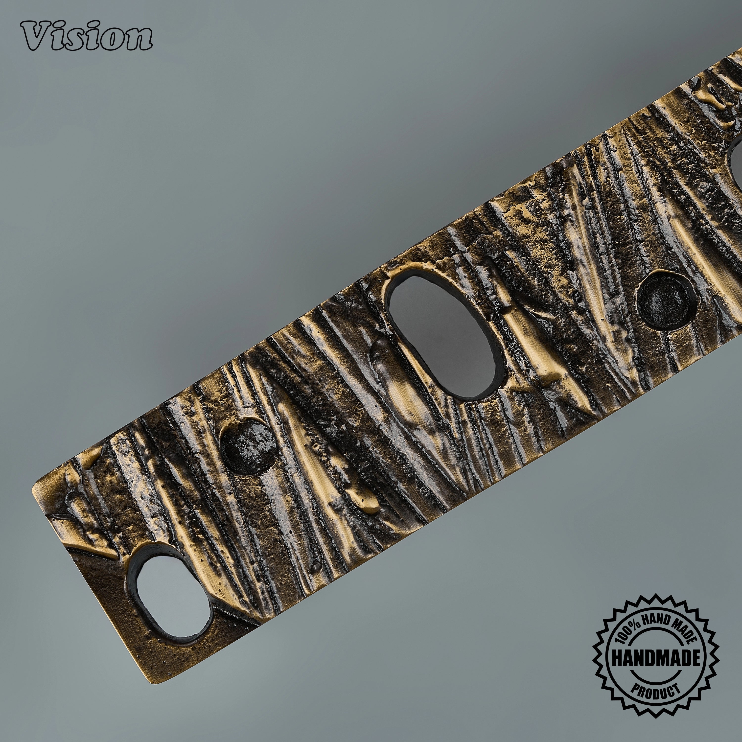 Solid brass antique bronze door handle with organic openings on entryway statement doors