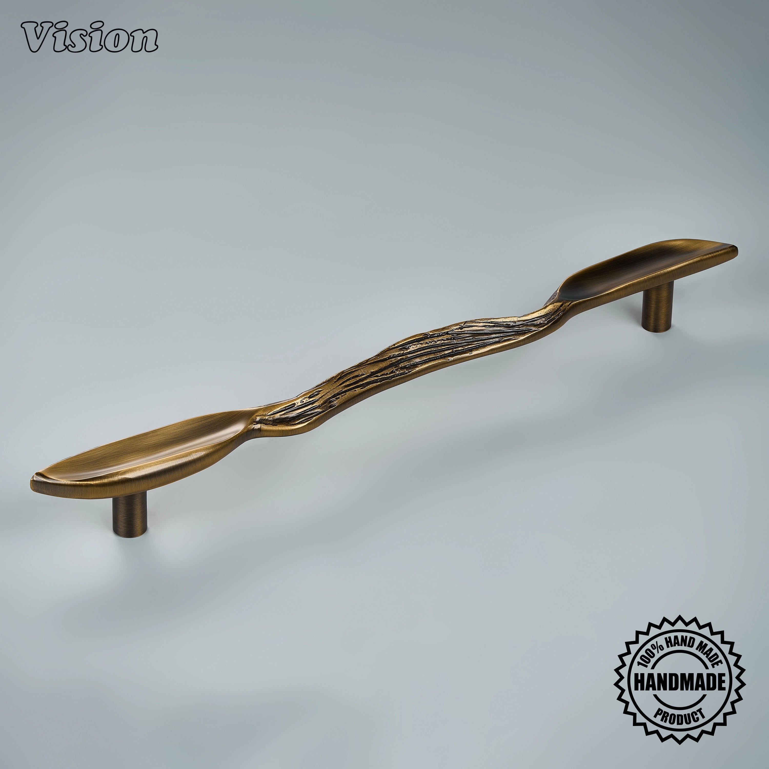Antique Bronze handcrafted appliance pull with fibrous textured center on custom pantry doors