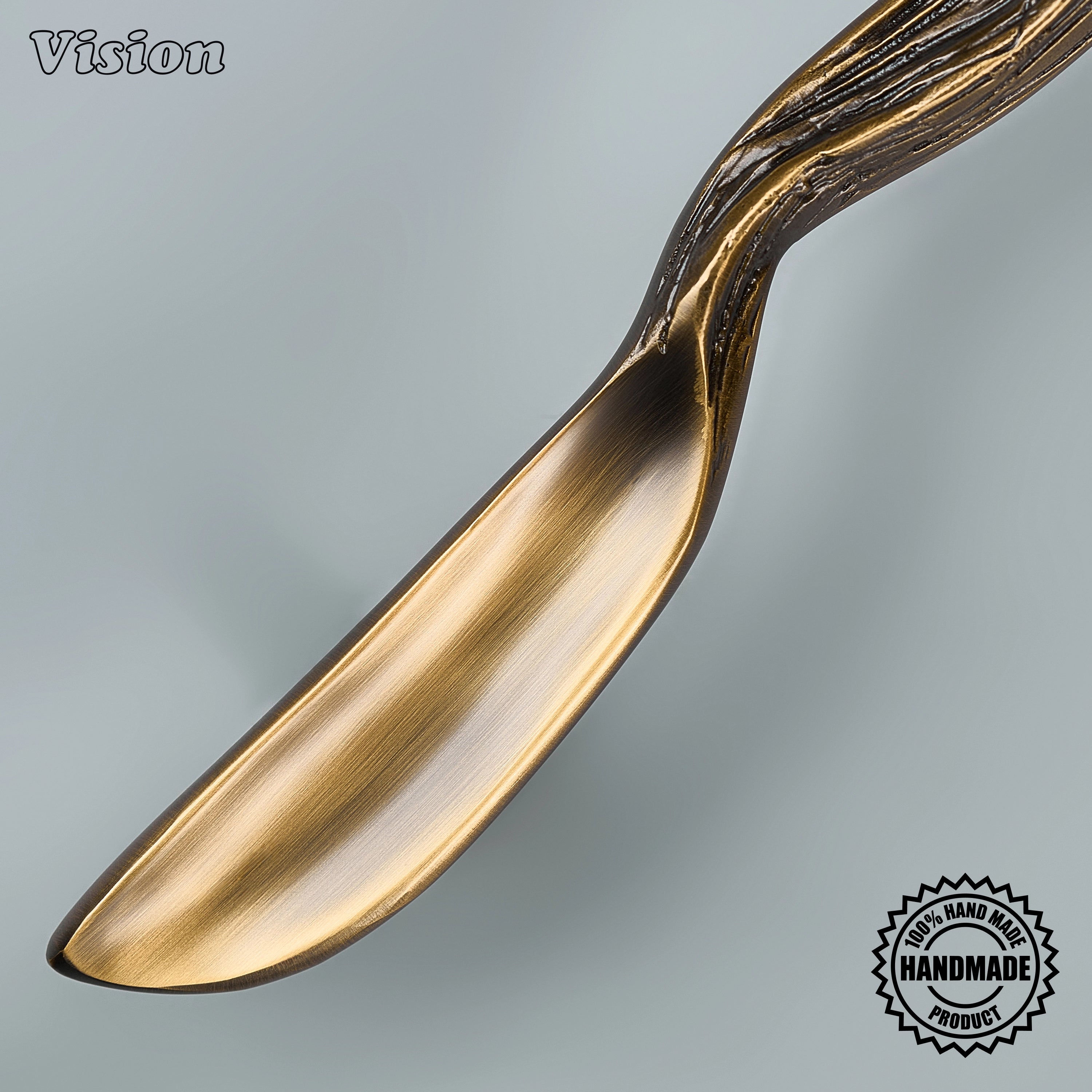 Heavy-duty antique bronze appliance pull with sculpted brass bar and posts for passage doors