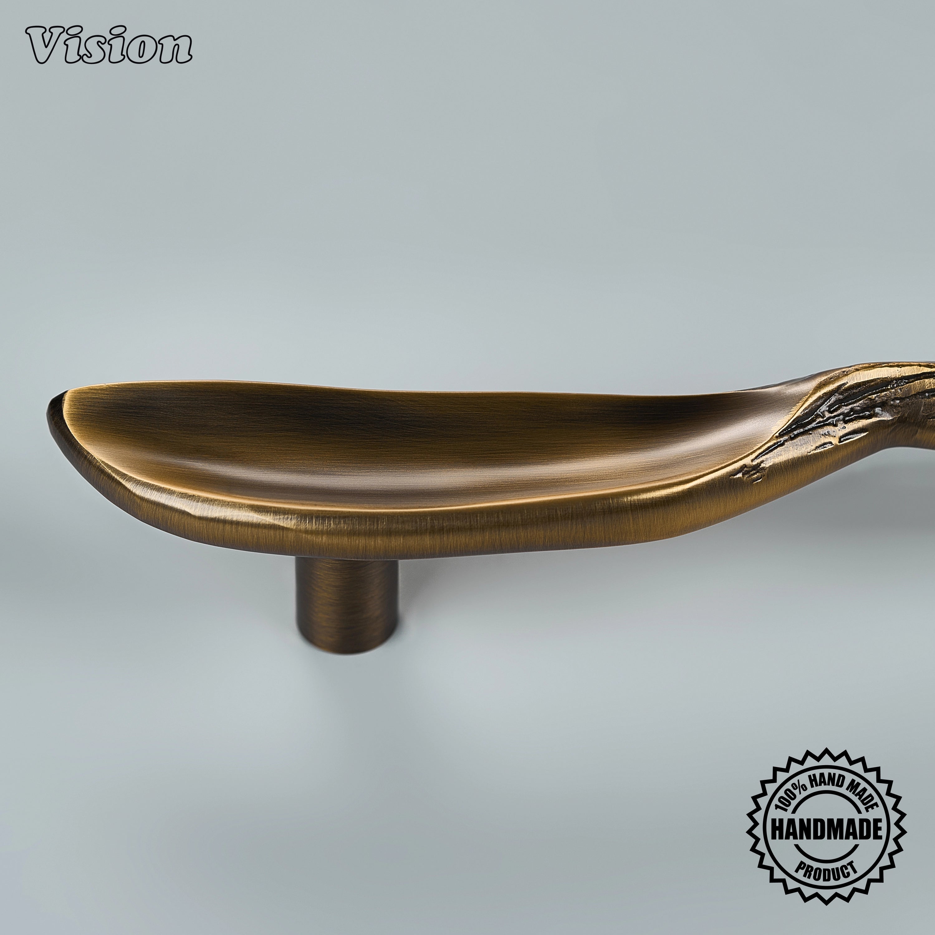 Handcrafted appliance pull in antique bronze finish featuring a bound textured bar for wardrobes